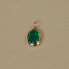 Anhänger aus massivem 14-karätigem Gelbgold mit natürlichem Smaragd – edler Schmuck
