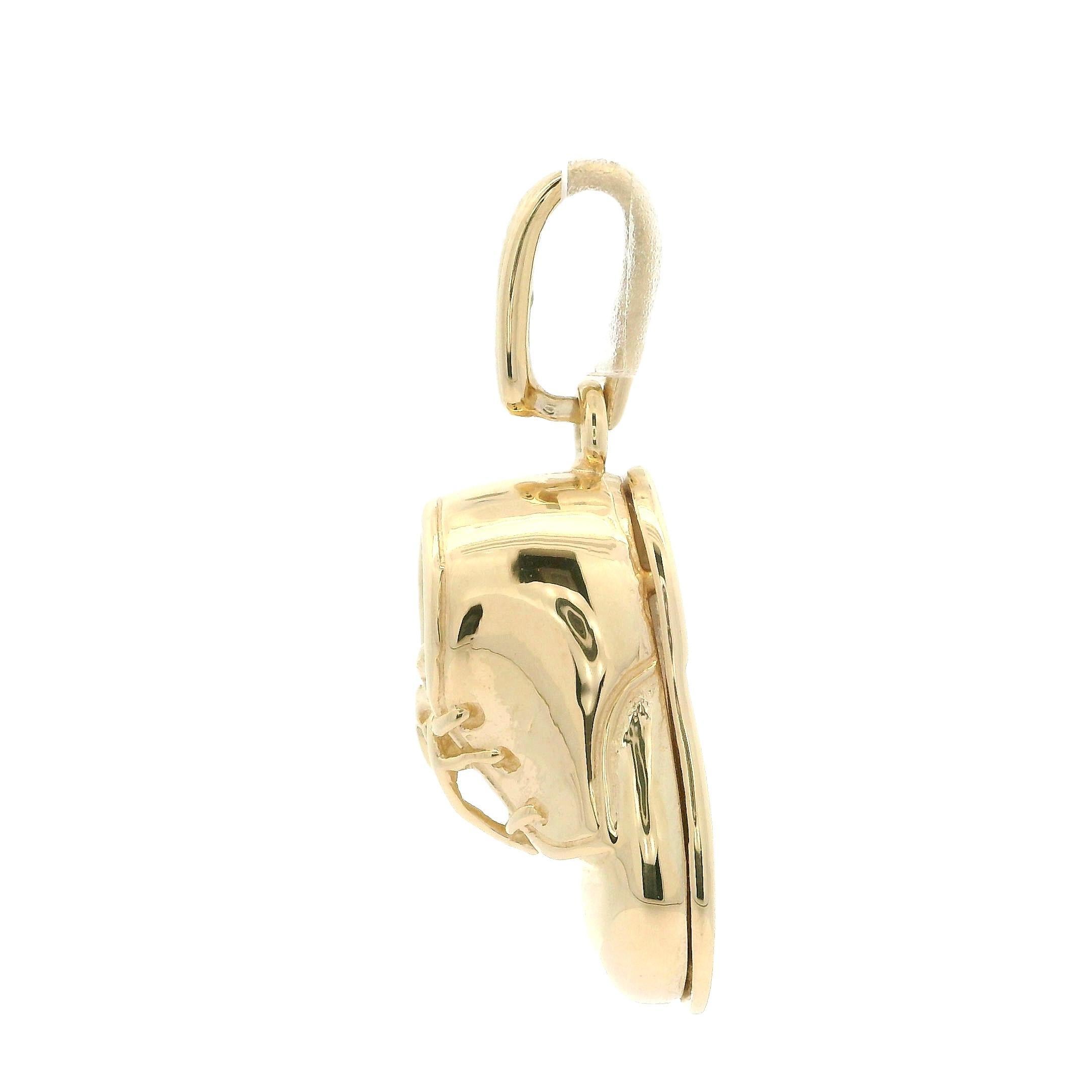 MATERIAL : Or jaune 14k massif
Poids : 5,71 grammes
Type de chaîne : Non inclus
Largeur : 9,7 mm (0,38
