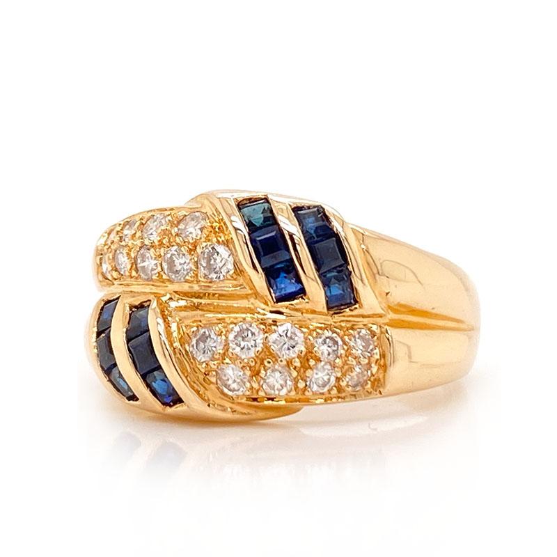 Solid 14K Yellow Gold Genuine Sapphire & Diamond Ring 4.6g Size 6.25
Excellent condition. This solid 14K yellow gold ring features 12 square genuine sapphires that measure approximately 1.90mm each. There are 18 genuine round brilliant diamonds that