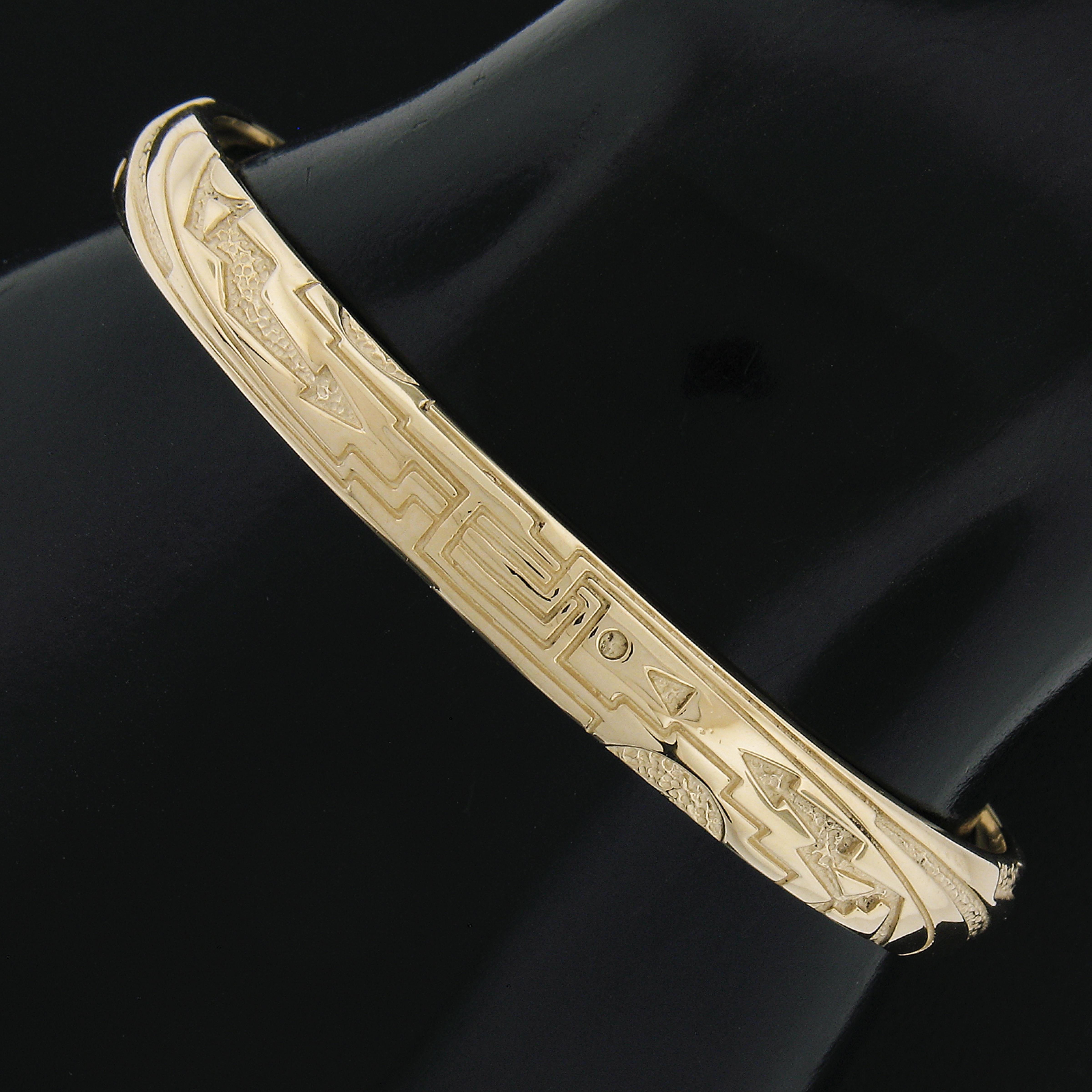 Material: Solid 14k Yellow Gold
Weight: 18.5 Grams
Chain Type: Textured Native American Design Open Cuff
Length: Will fit up to a 6.5 inch wrist.
Clasp: No Clasp
Width: 6.9mm (0.27