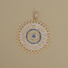 Anhänger aus massivem 14-karätigem Gelbgold mit natürlichem blauem Saphir, Diamanten und „Sunburst“-Motiv sowie „Evil Eye“-Motiv