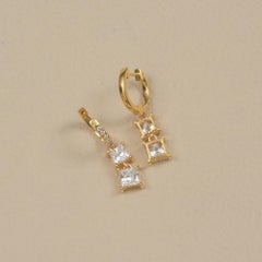 Orecchini a cerchio "huggie" con diamanti naturali taglio princess in oro giallo massiccio 14k