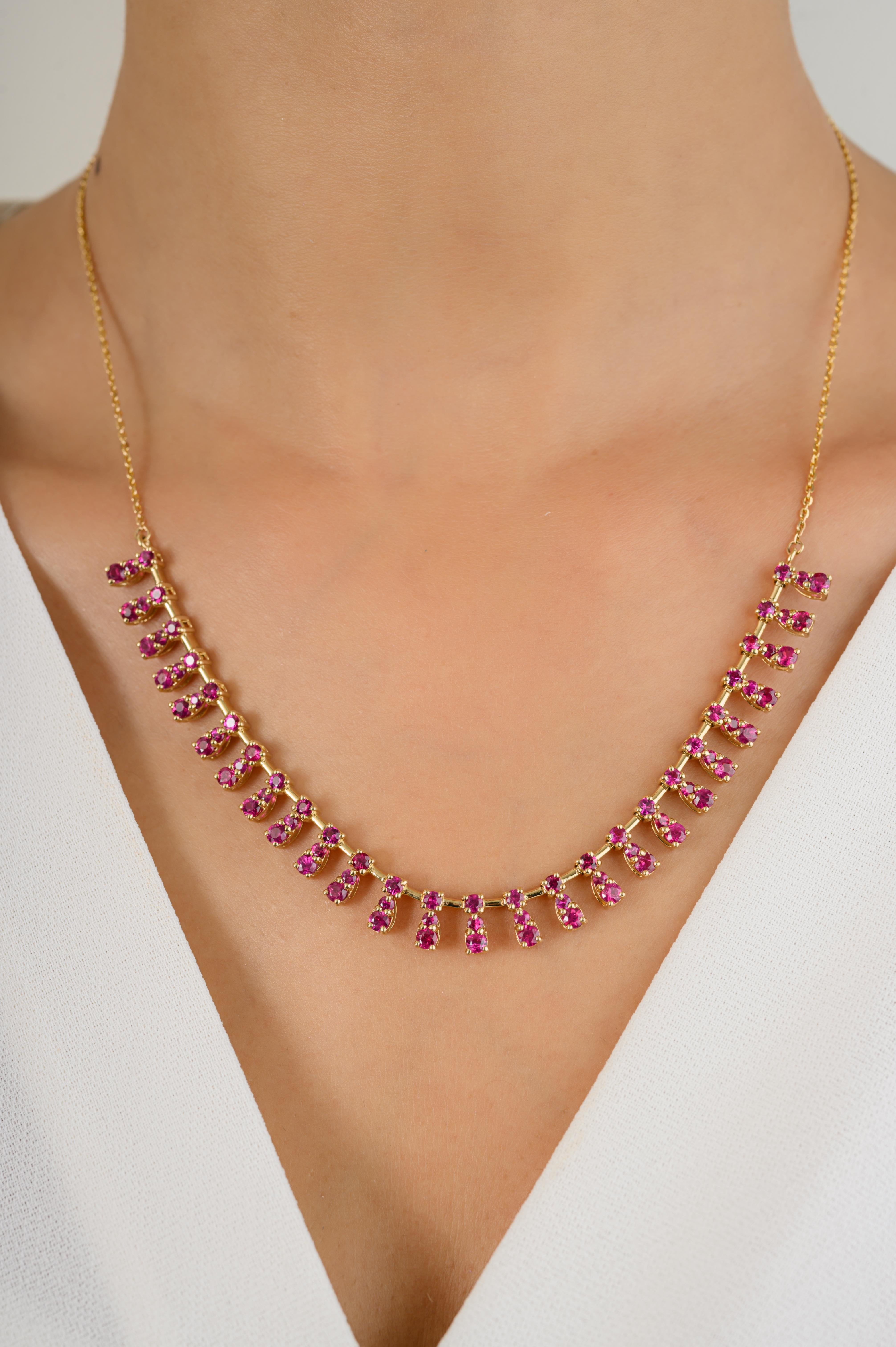 Unique Fine Ruby Choker Necklace in 14K Gold studded with round cut ruby of 4.28 carats. This stunning piece of jewelry instantly elevates a casual look or dressy outfit. 
Ruby improves mental strength.
Designed with round cut ruby set in prong