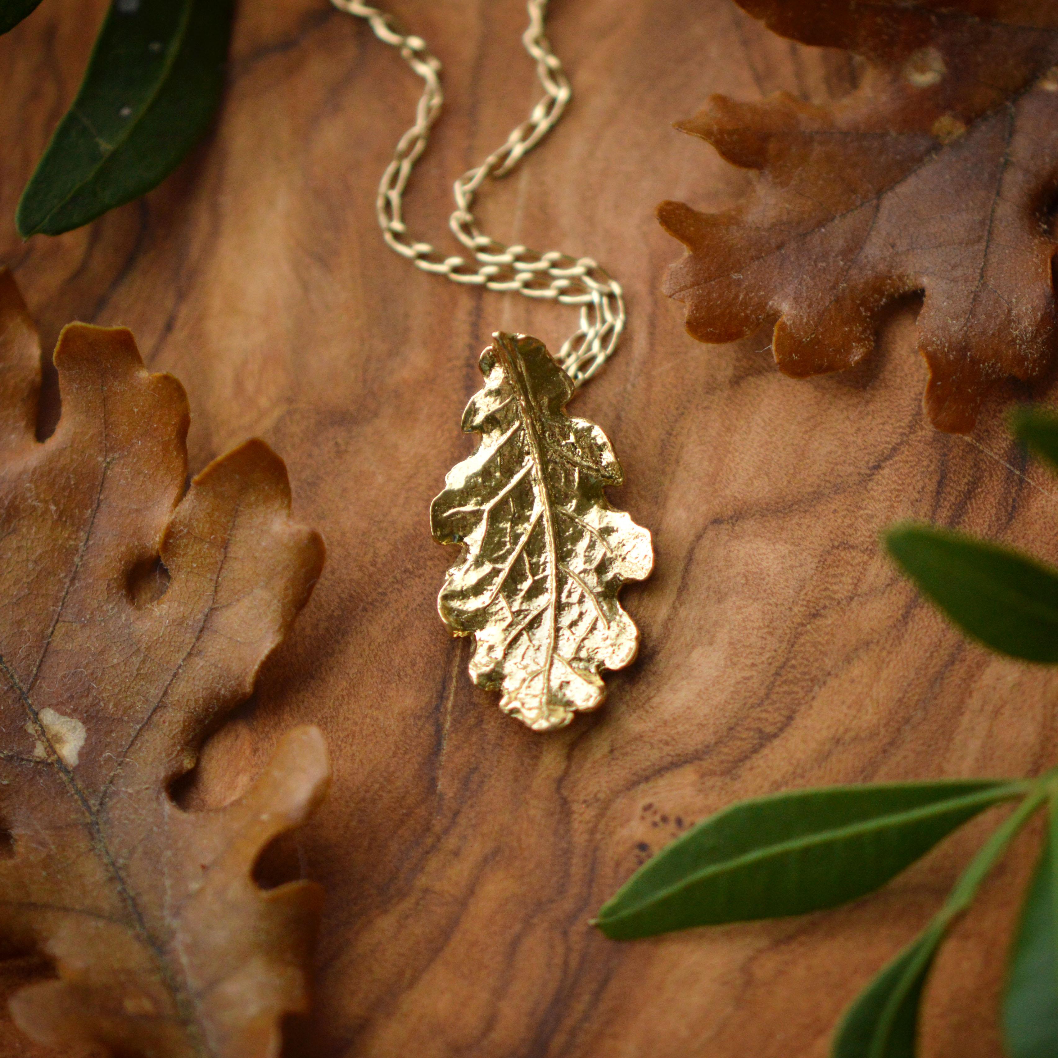 This oak leaf pendant is cast in solid 18 Carat gold and finished by hand, and is created from Lucy's original hand-sculpted design. 

This oak leaf pendant is made in London, United Kingdom using recycled or Fairtrade Gold. Metals are sourced from