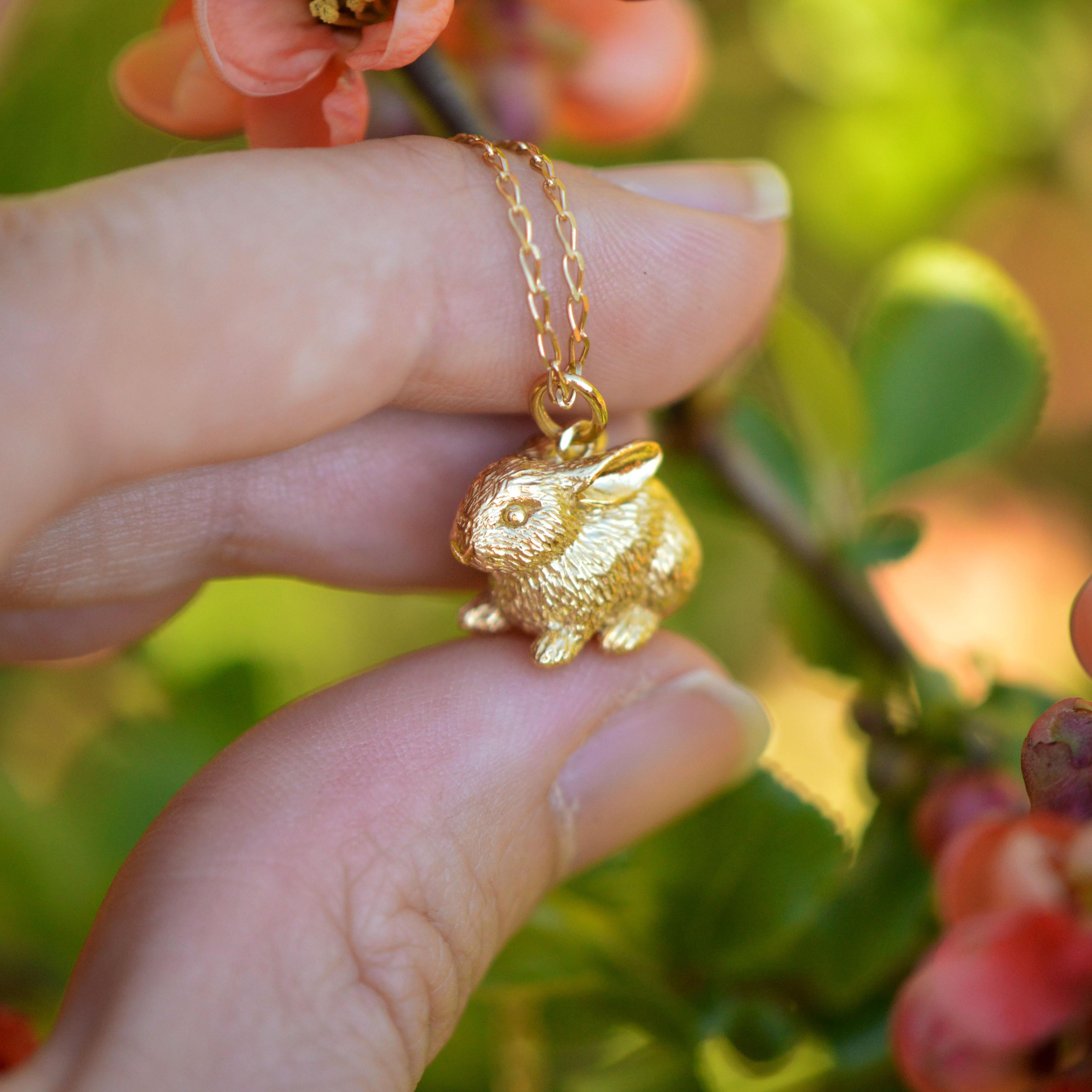 This miniature baby rabbit pendant is cast in solid 18 Carat gold and finished by hand, and is created from Lucy's original hand-sculpted design. 

This bunny pendant is made in London, United Kingdom using recycled or Fairtrade Gold. Metals are