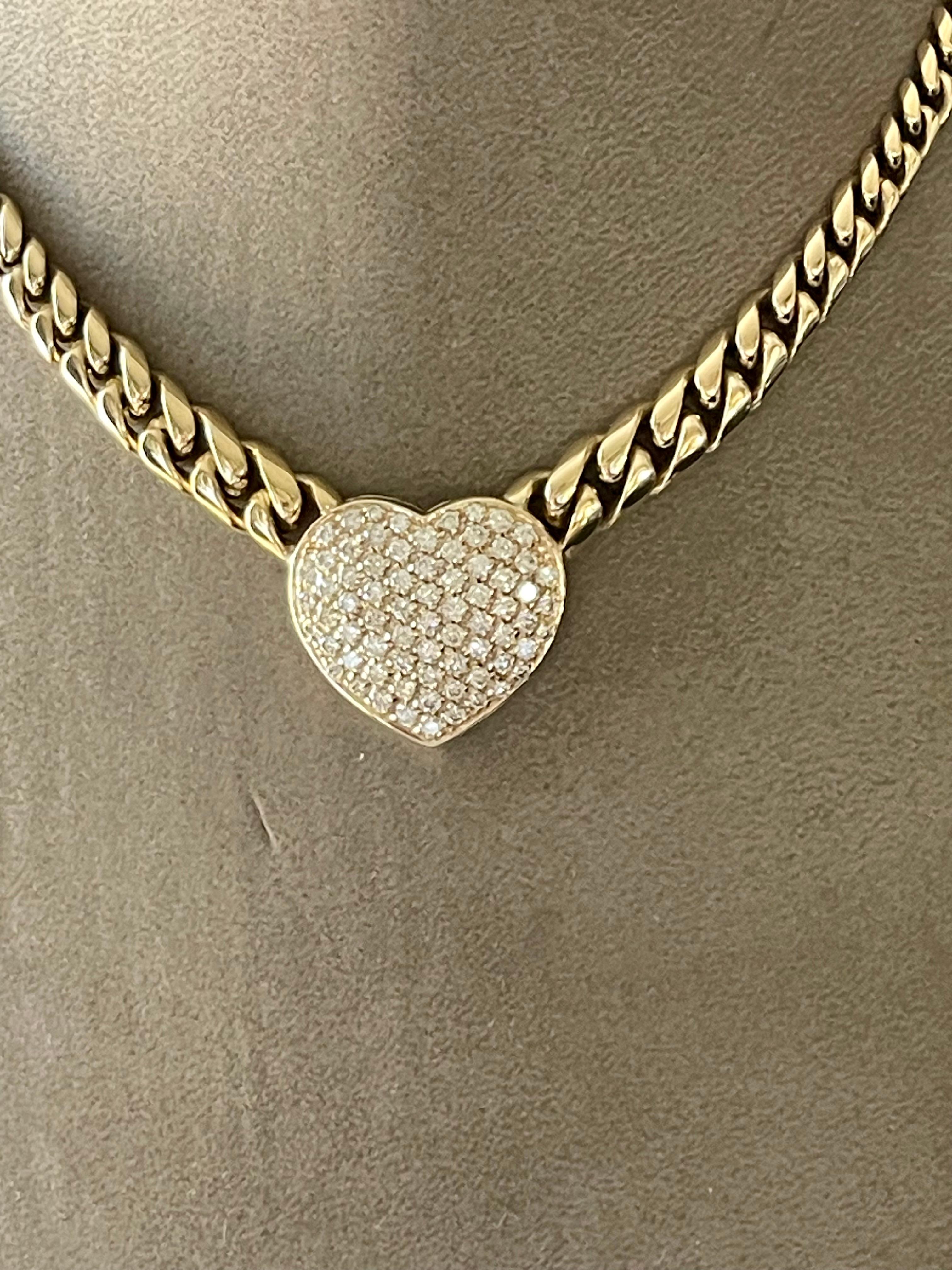 A timeless and solid 18 K yellow Gold Cuban link Necklace featuring a pave set Diamond heart pendant. This stylish necklace features approximately 2.50 ct of fine white brilliant cut Diamonds, G color, vs clarity. 
Lenght: 42 cm.
Weight: 53.41