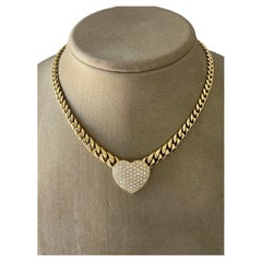 Solid 18 K yellow Gold Cuban link necklace with pave set Diamond heart pendant