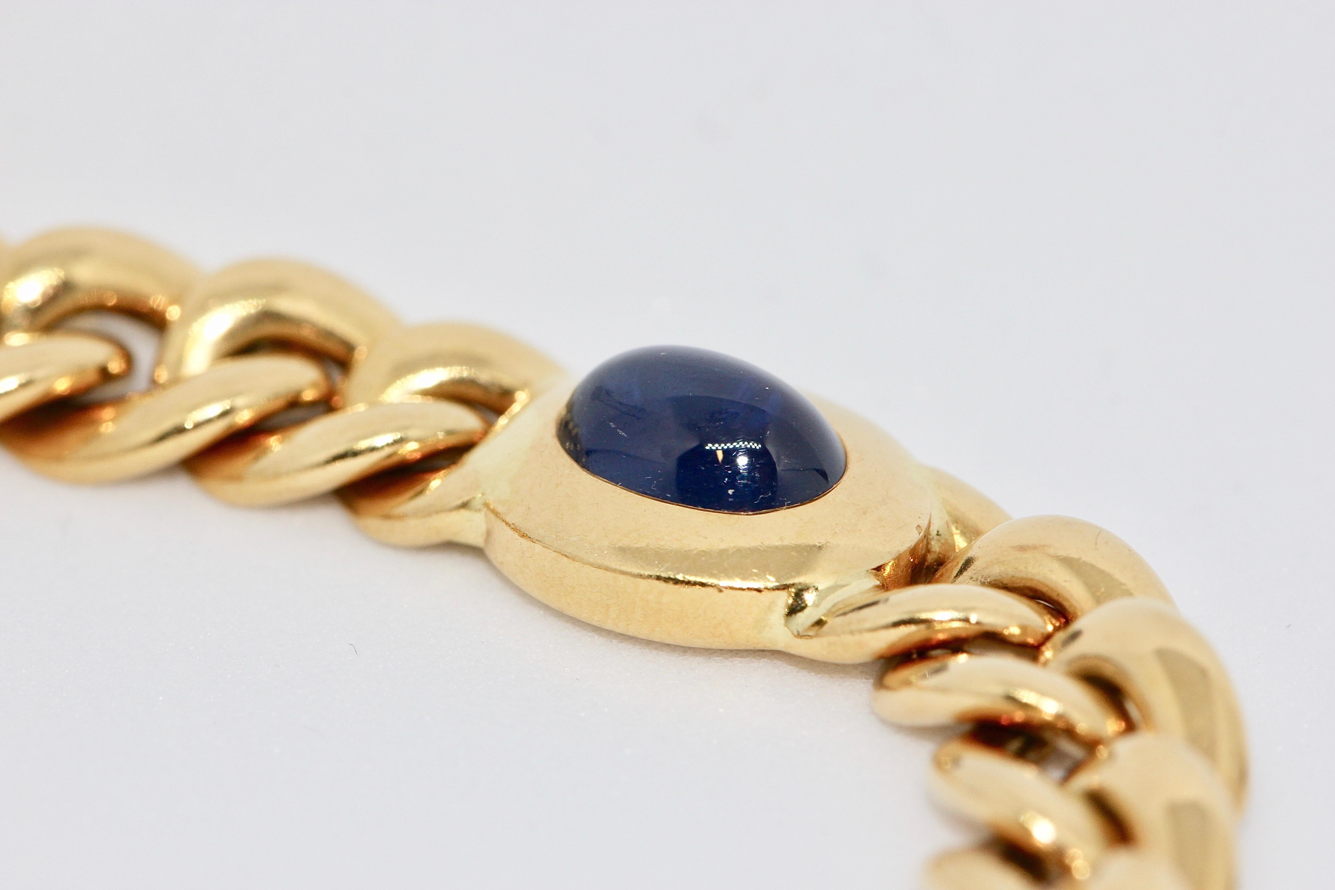 Solid 18 Karat yellow gold bracelet with four sapphire cabochons.

Hallmarked 750, CB
We also offer the same bracelet with emeralds. Please take a look at our other articles.