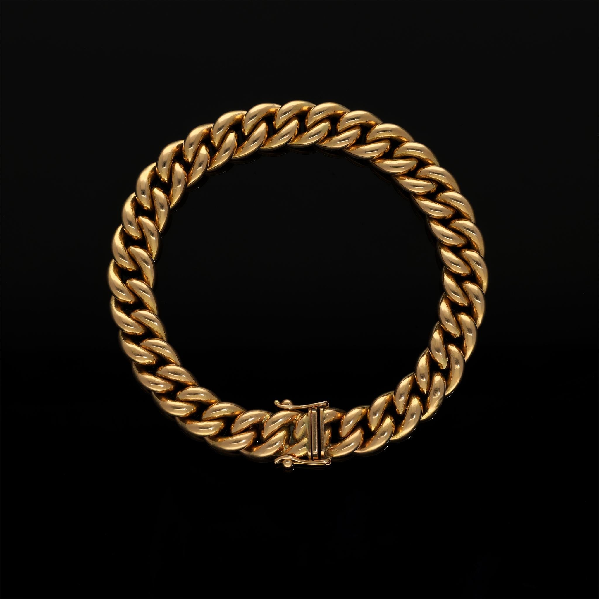 Ein wunderschönes massives 18k 750 Gelbgold Kandare Gliederarmband! Dieses schöne Unisex-Kettenarmband ist in einem hervorragenden Zustand mit einem festen Verschluss und extra Sicherheitsscharnieren erhalten.

Dieses schöne, geschlechtsneutrale