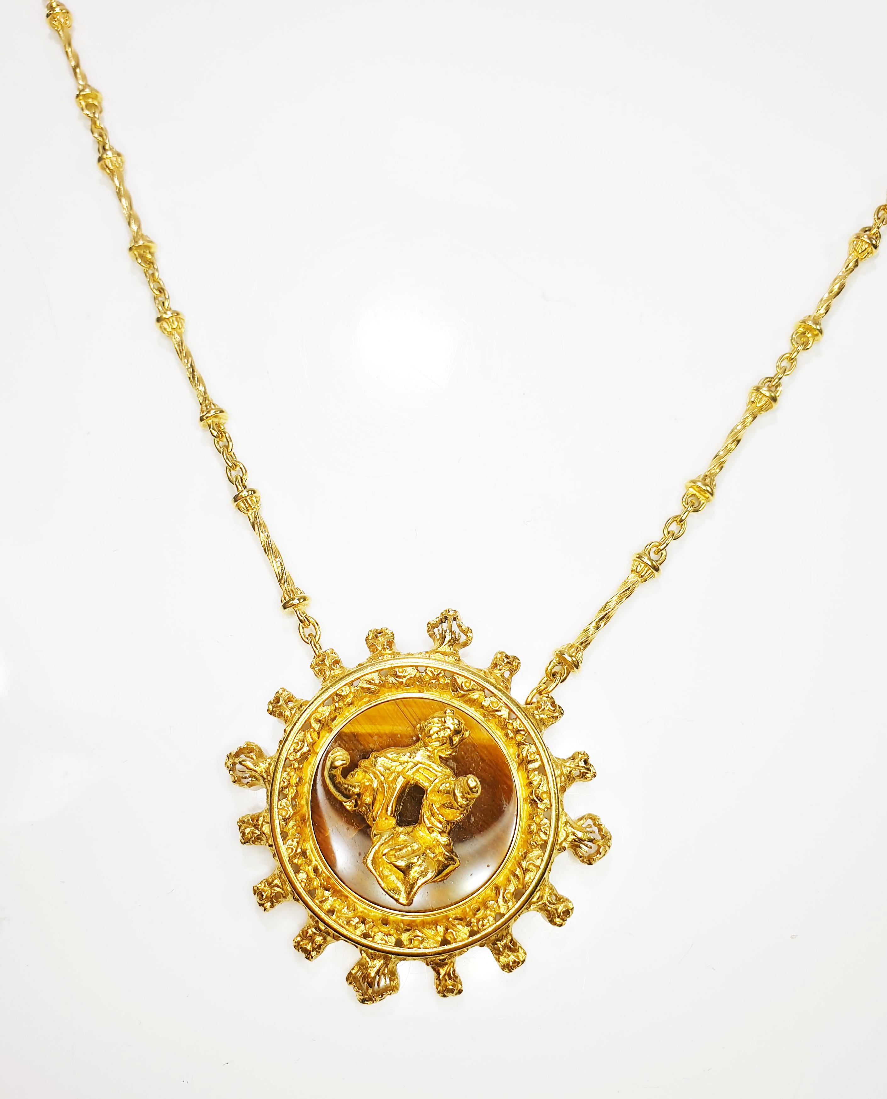 Unique only One in series of ten Limited Edition 18k Yellow Gold Salvador Dali Madonna de Port Lligat Pendant Necklace / Bracelet with tiger´s eye center base 
This is a limited edition numbered piece from 1970's, number 1 out of 10 ever made.
This