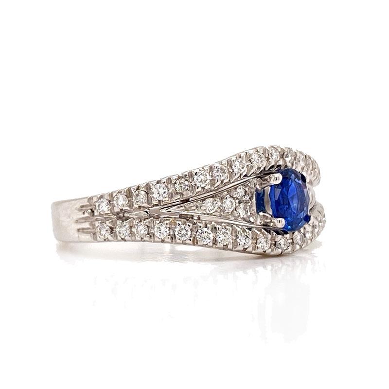 Solid 18K White Gold Genuine Sapphire & Diamond Ring 6.2g
Excellent condition. This solid 18k white gold ring features a genuine oval sapphire in the center that measures approximately 4.70mm X 3.76mm. There are 46 genuine diamonds that weigh