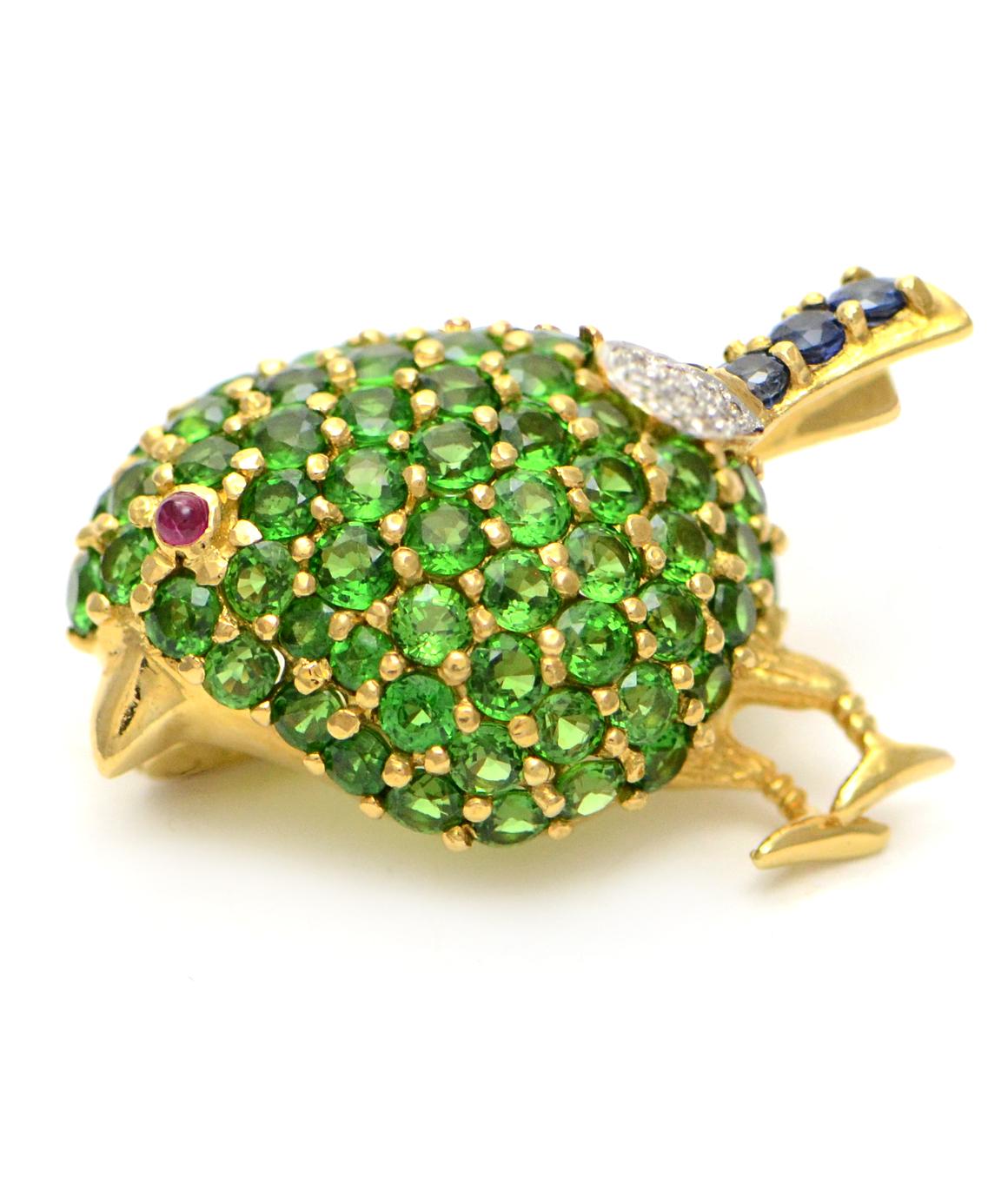 Solid 18K Yellow Bird Pin/ Pendant! Genuine Tsavorite, Ruby, Sapphire & Diamond

This stunning piece of art can be worn as a pendant or a brooch/ pin! It has a collapsable bail, and a pin to be worn however chosen! There are approximately six