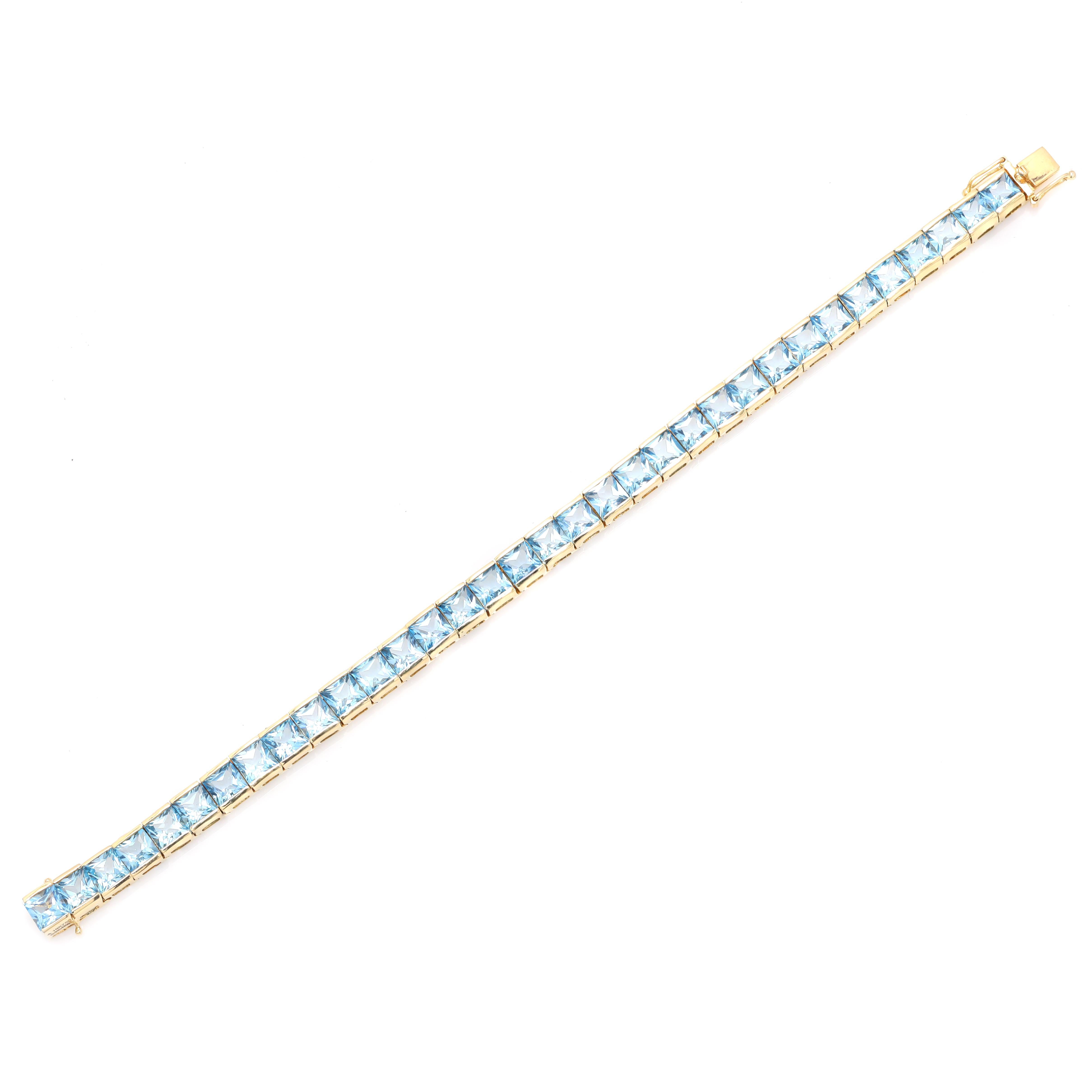 Art Déco Bracciale da tennis in oro giallo massiccio 18K da 13,65 carati con topazio blu per donna in vendita