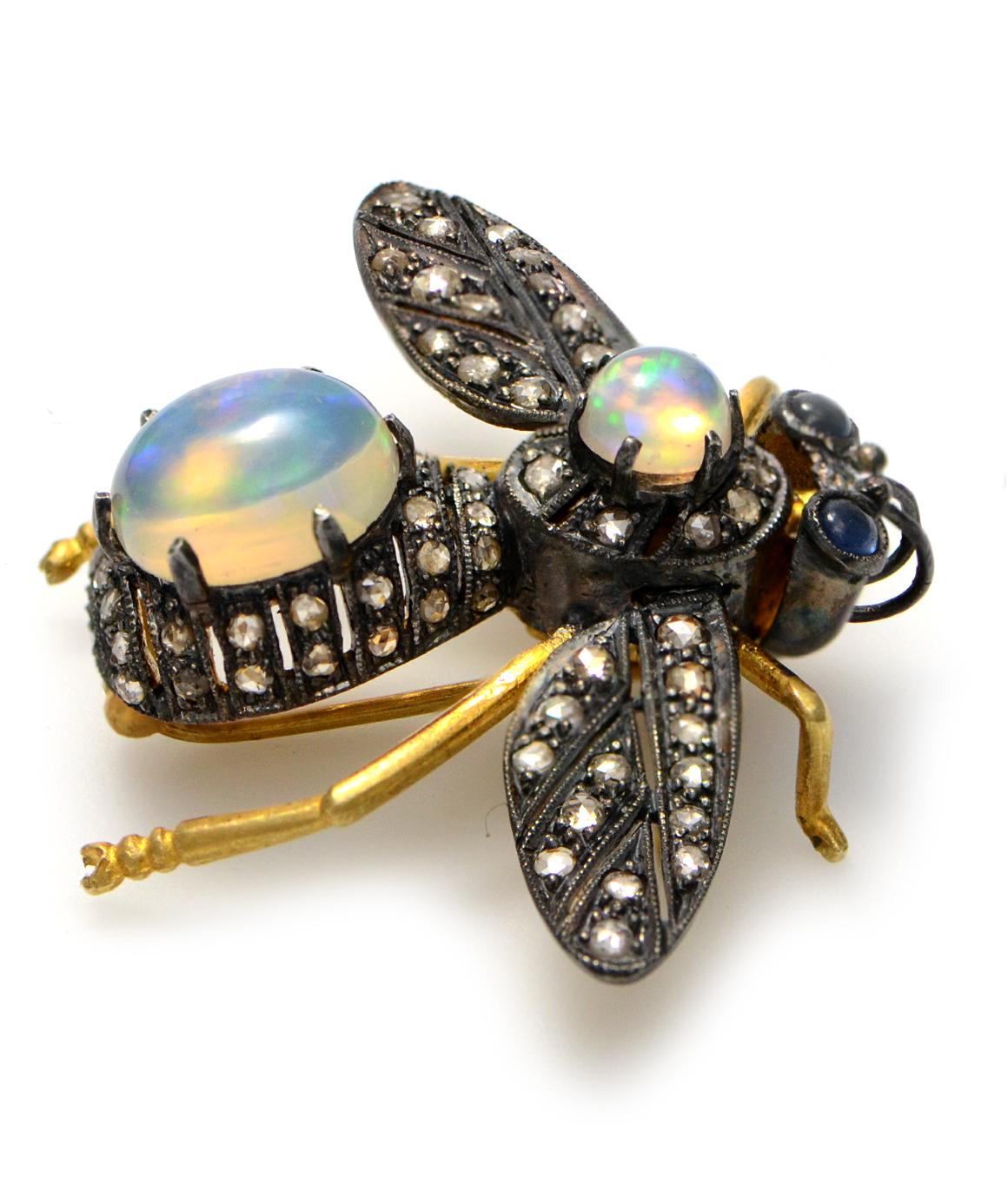 Solid 18K Yellow Gold & 925 Diamond, Opal & Sapphire Bee Pin/Pendant  6.8g 
Excellent condition! This bee pin composed of solid 18k yellow gold and sterling silver features wings that can move. The bees body features two genuine opals that measure