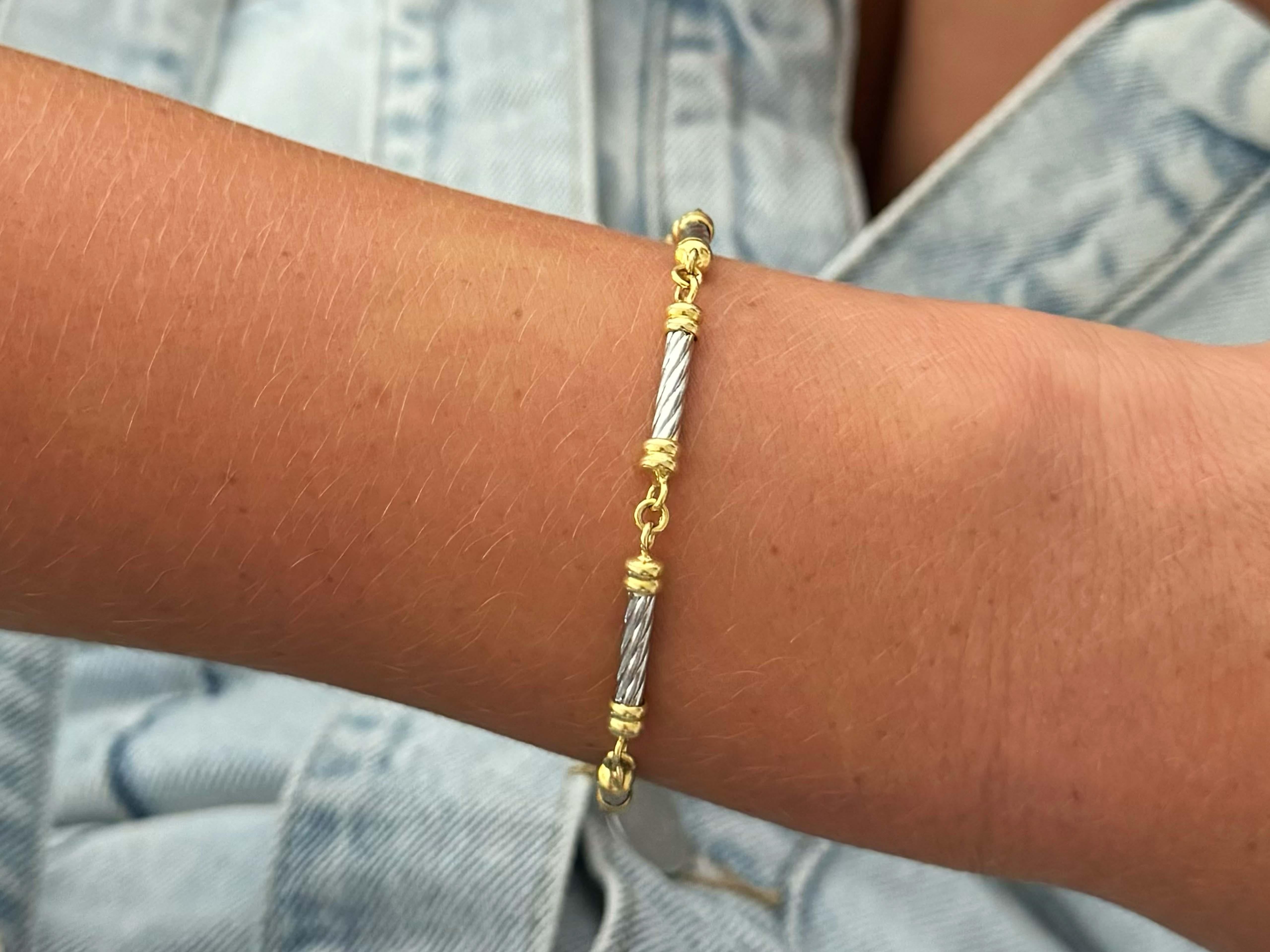 Armbänder Spezifikationen:

Metall: 18k Gelbgold und Platin 950

Länge des Armbands: ~7.5