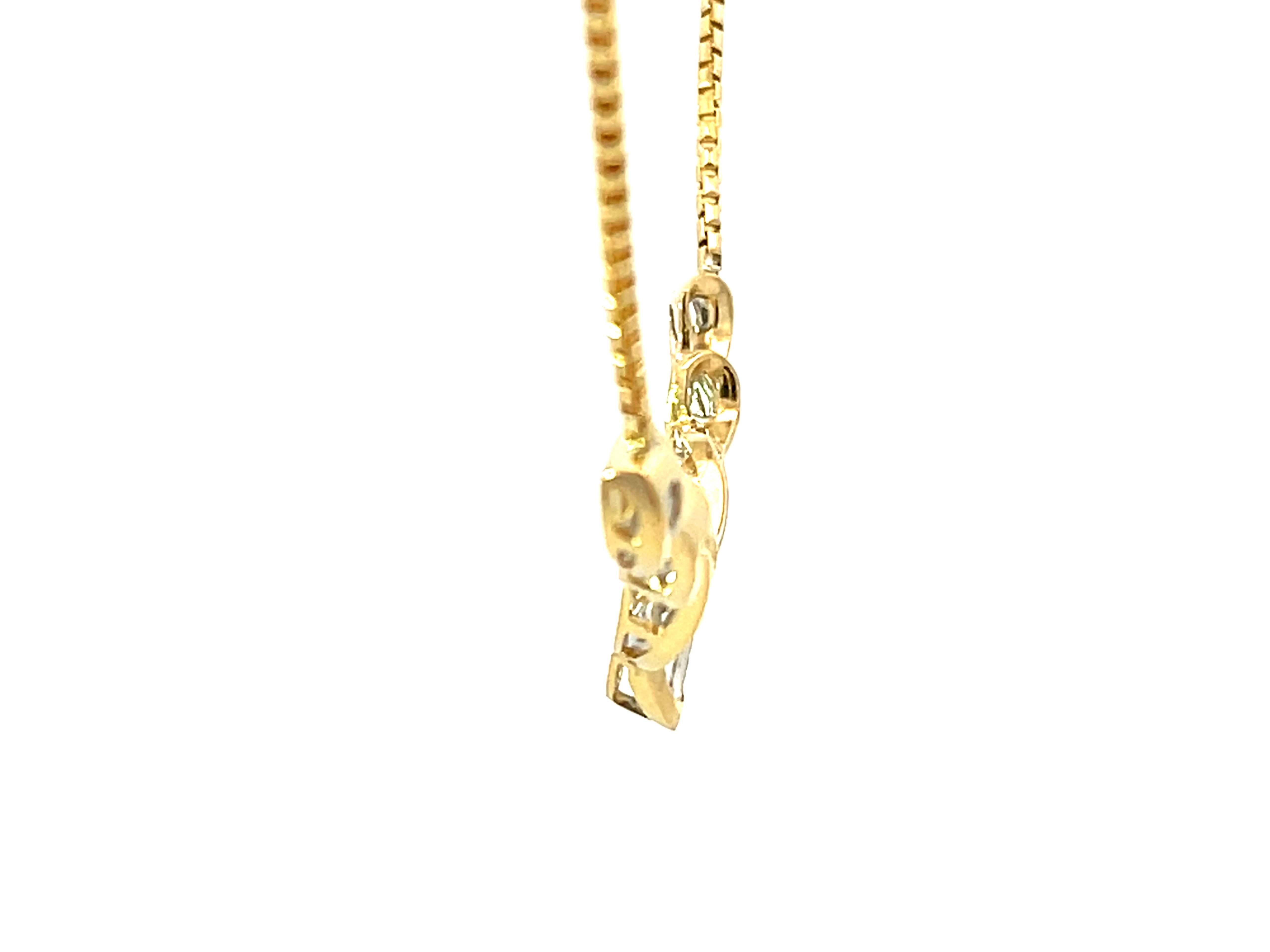 Solid 18k Yellow Gold Baguette Diamond Swirl Pendant Necklace In Excellent Condition For Sale In Honolulu, HI