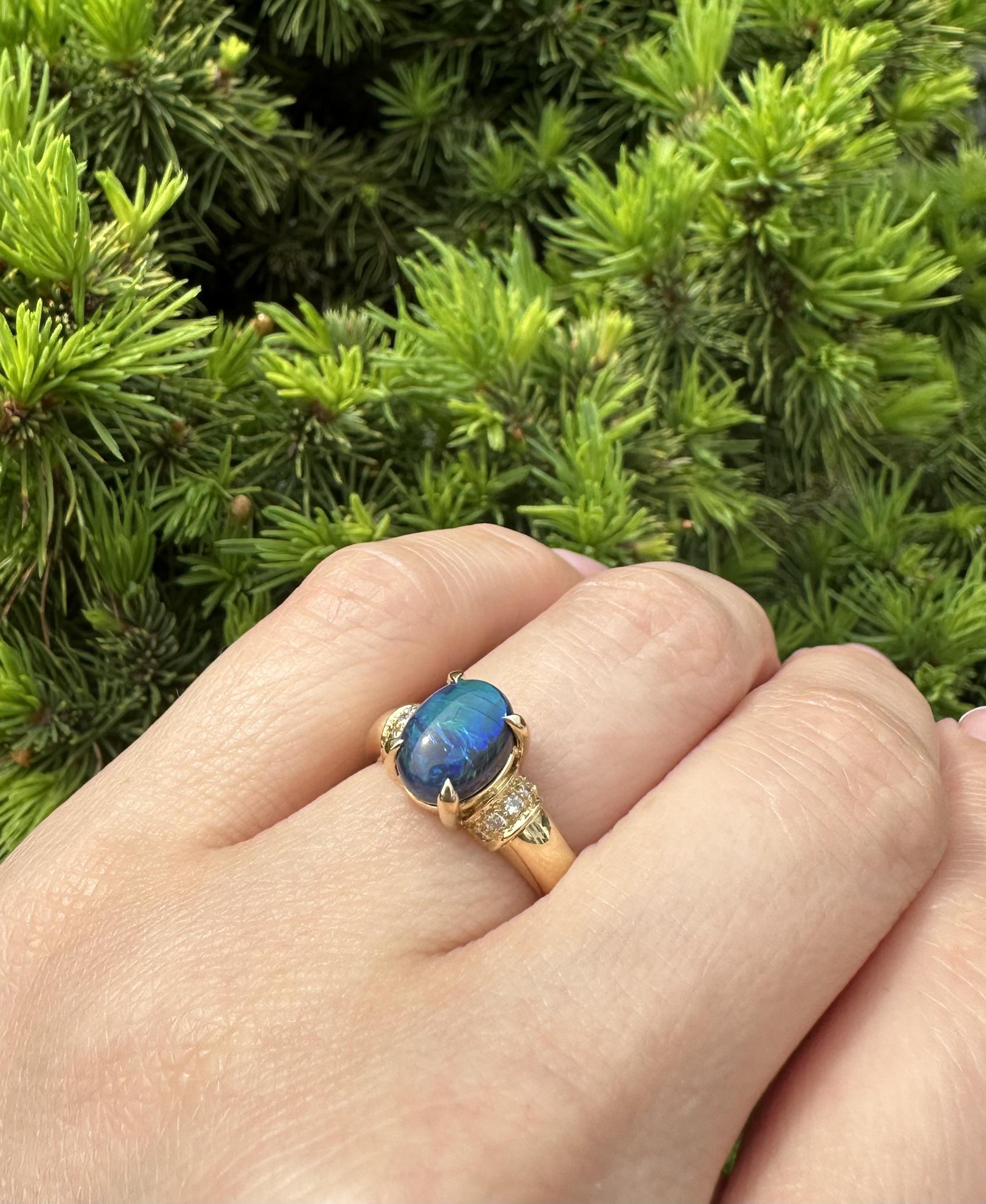 --Stone(s):--
(1) Natural Genuine Opal - Oval Double Cabochon Cut - Prong Set - Black Color w/Strong Play of Blue & Green - 2ct (Exact)
**See Certification Details Below For More Info**
(10) Natural Genuine Diamonds - Round Brilliant Cut - Pave Set