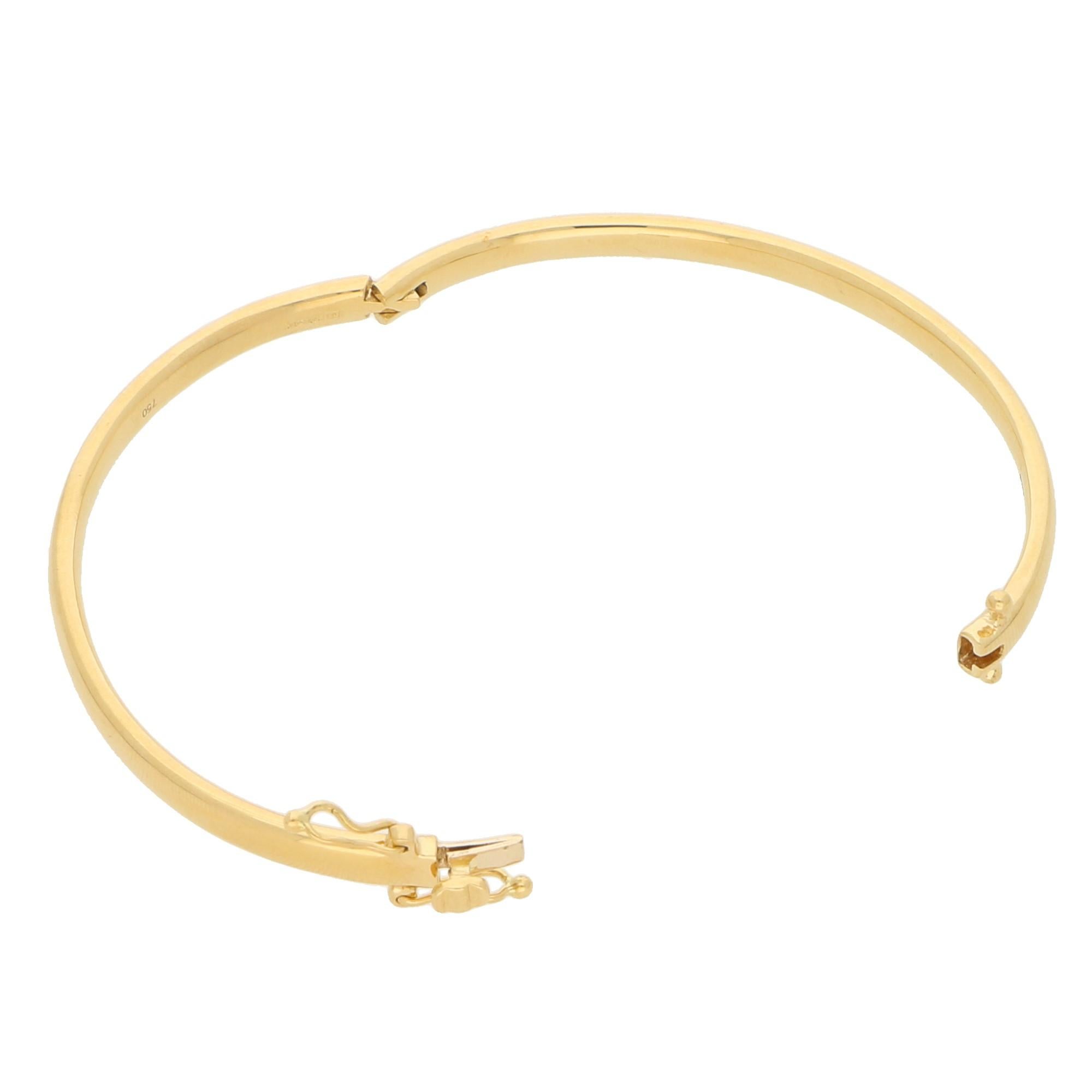 Modern Solid 18 Karat Yellow Gold Hinged Bangle with Safety Catch