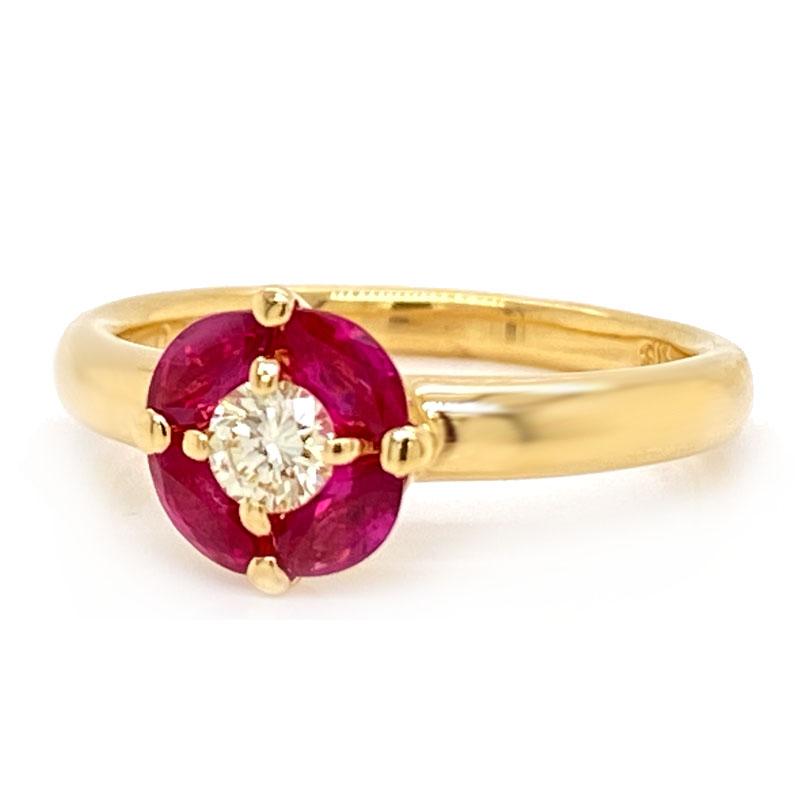 Solid 18K Yellow Gold Natural Ruby & Genuine Diamond Ring 3.6g
Excellent condition. This solid 18K yellow gold ring features a center genuine diamond that weighs 0.15ct and 4 marquise natural rubies that weigh 0.56cttw. The ring is a size 5.50 and