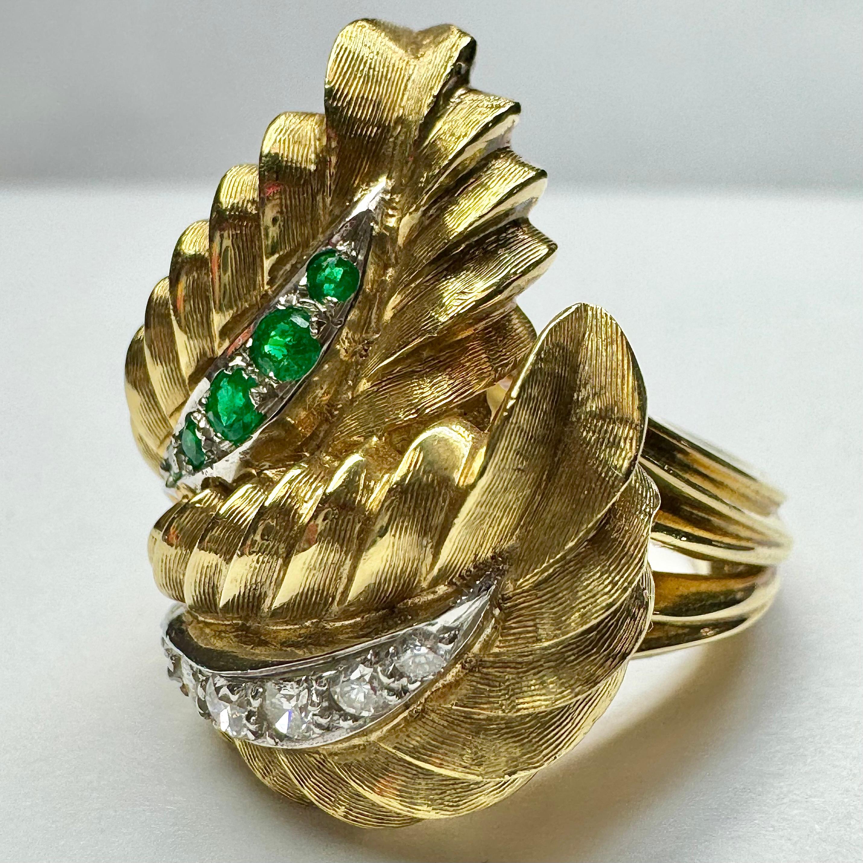 Gorgeous and unique, one-of-a-kind vintage emerald and diamond ring, in solid 18k yellow gold. Beautiful golden leaf design with delicate lined texture detailing the intricate layers of the leaf pattern. There are 5 stunning green emeralds featured
