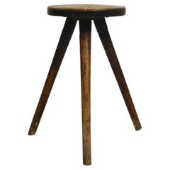 Solid 1930s three-legged industrial stool made of oak Solid 1930s three-legged industrial stool made of oak