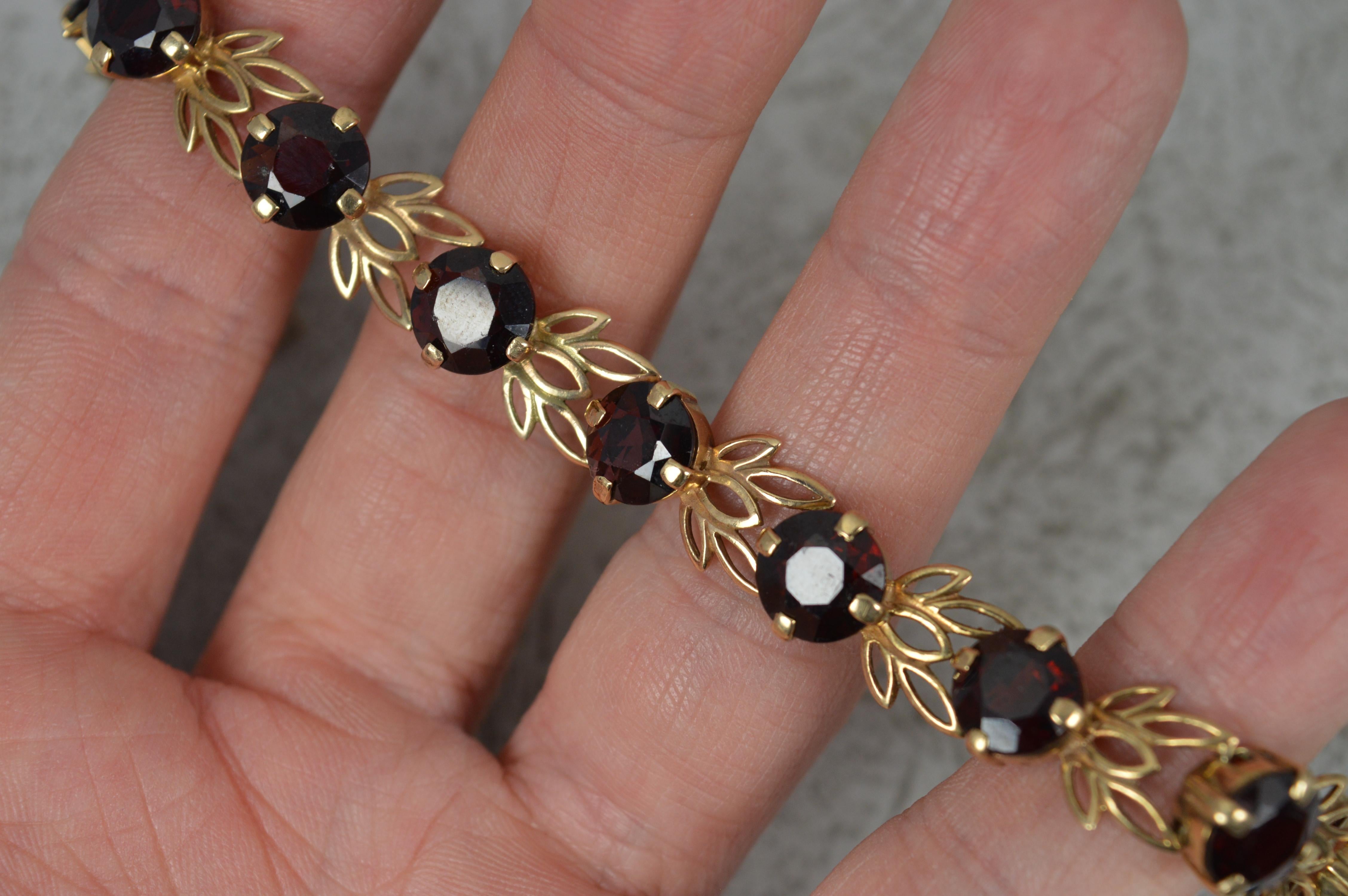 Solid 9 Carat Gold and Garnet Floral Bracelet In Good Condition For Sale In St Helens, GB