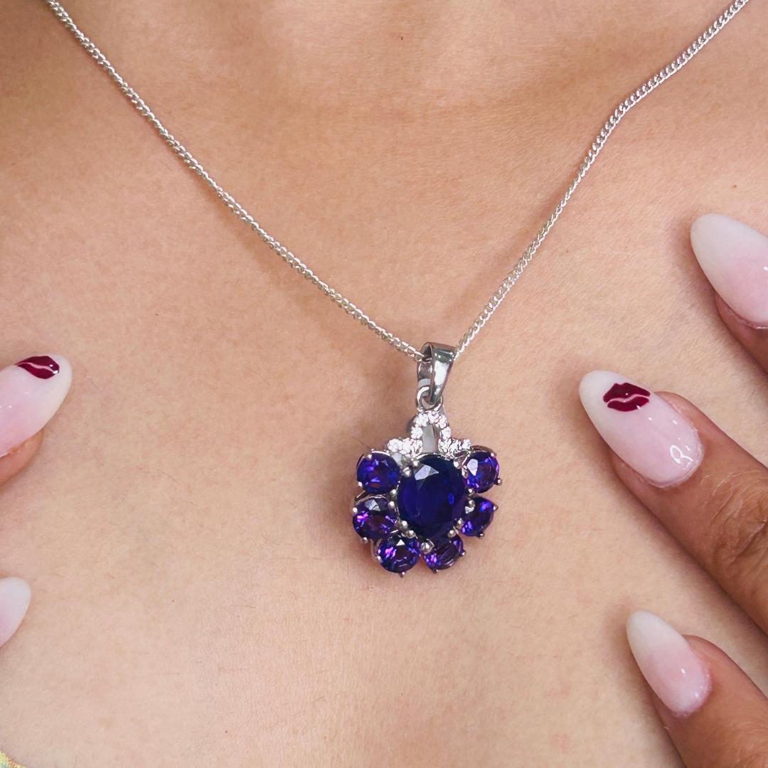 Solid 925 Sterling Silver Natural Amethyst Cluster Pendant in sterling silver studded with oval, round cut amethyst. This stunning piece of jewelry instantly elevates a casual look or dressy outfit.
Amethyst Gemstone enhances the intellectual