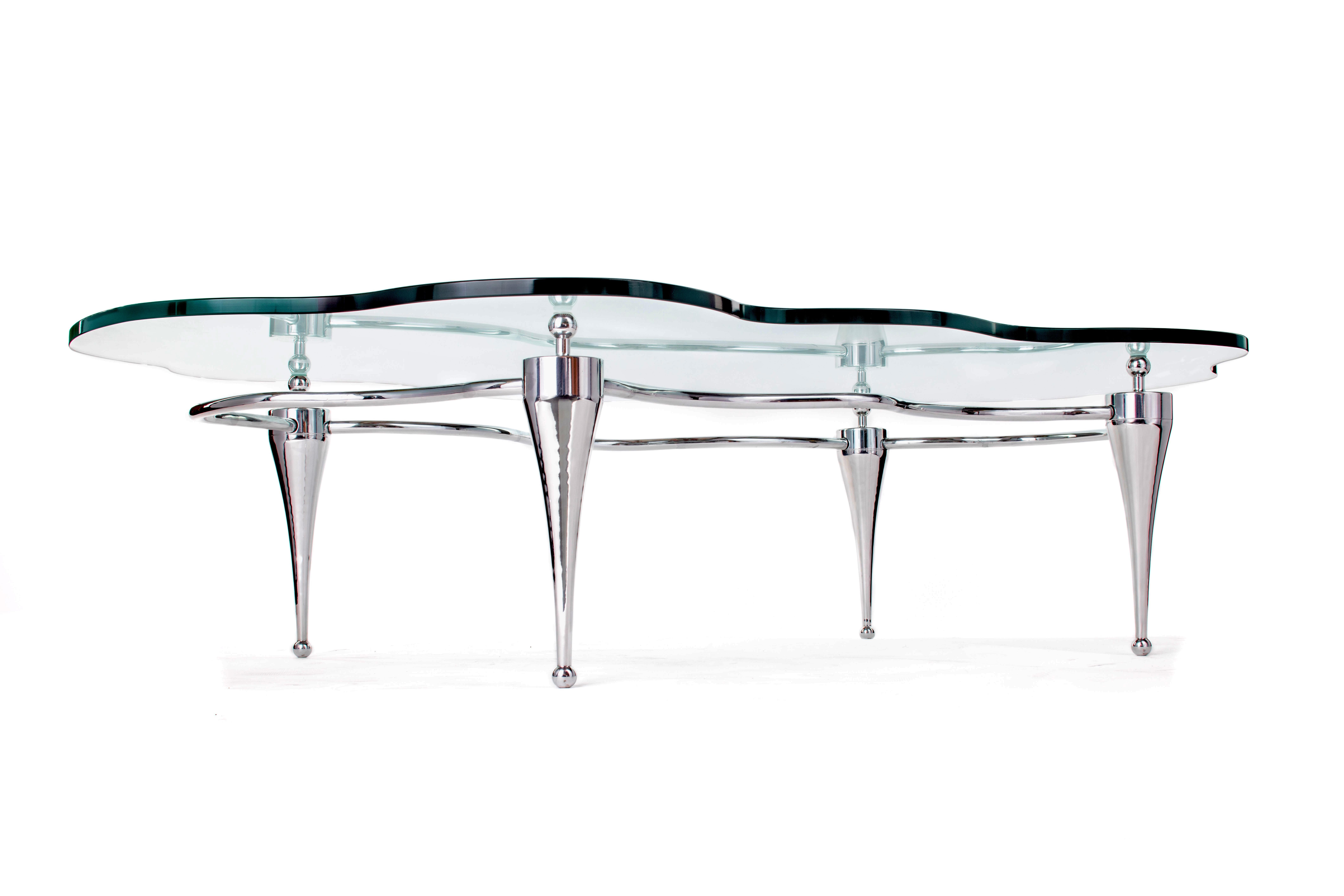 Art déco Table basse avec plateau en verre et base en aluminium poli en vente