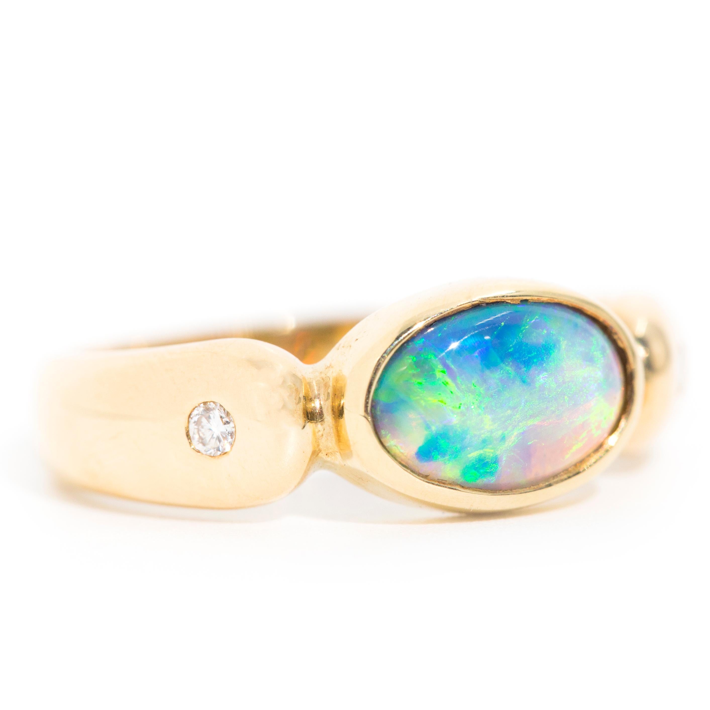 Modern Solid Australian Crystal Opal and Round Diamond Three-Stone Ring in 18 Carat