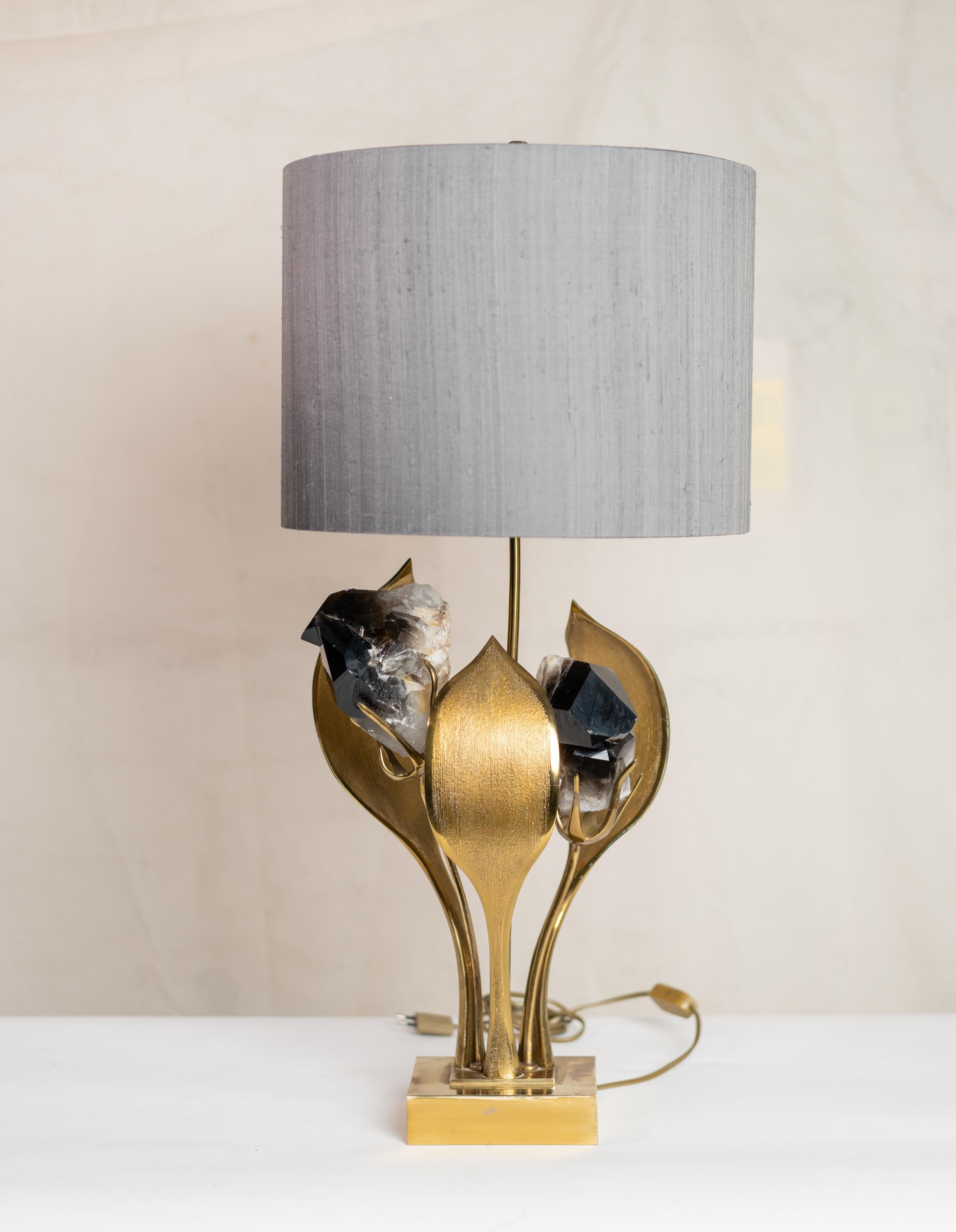 Solid brass and gilded bronze table lamp by Willy Daro inset with black quartz. Signed: 