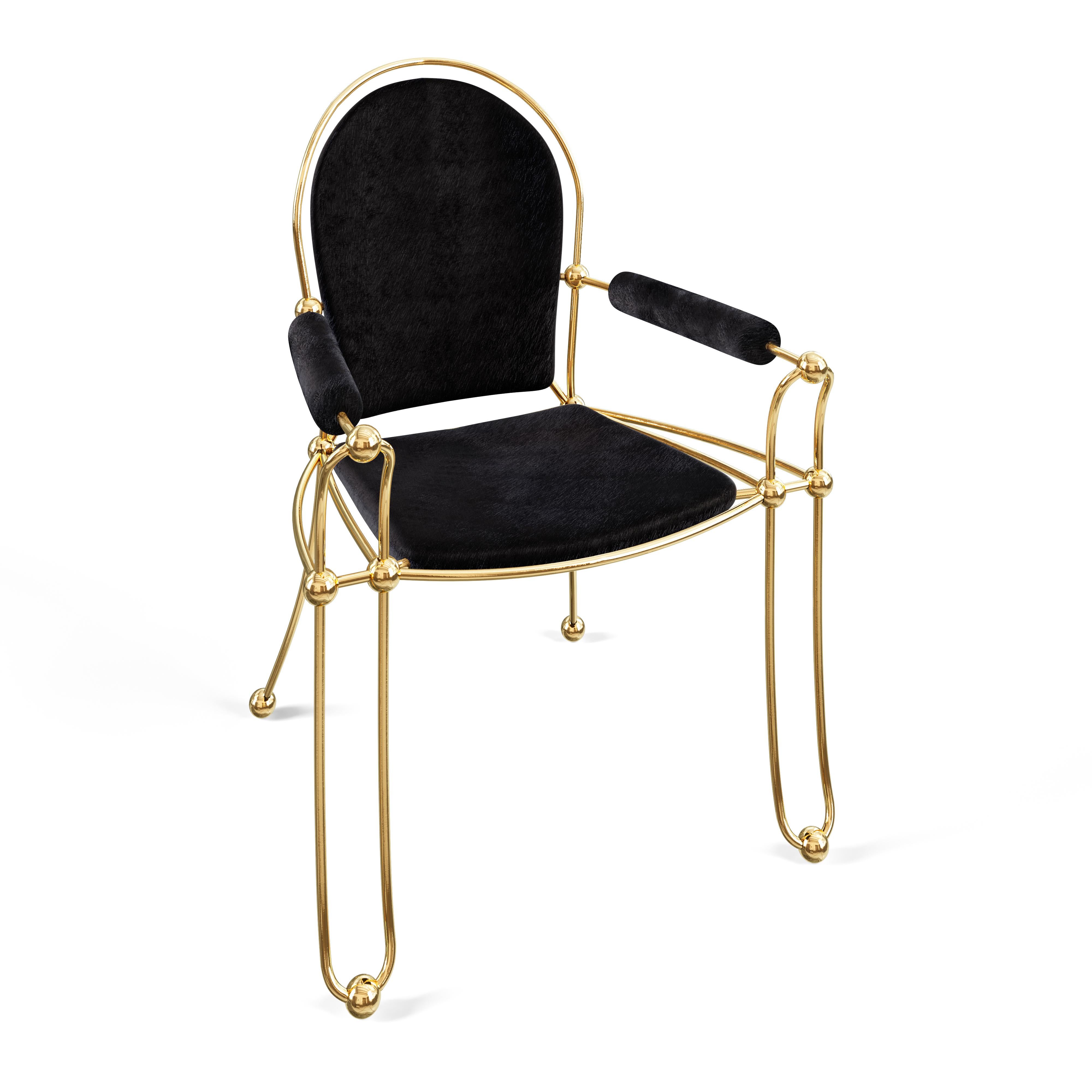 The 2-for-1 Chair has contemporary modern lines with old-world comfort and silhouette. Designed with beautiful proportion and scale the 2-for-1 chair has traditional craftsmanship with a modern contemporary style.

Made from solid brass and