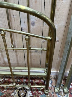 Solid brass barred bed 1900