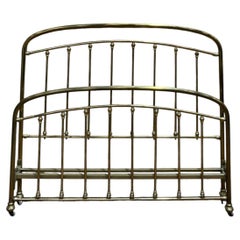Solid brass barred bed 1900