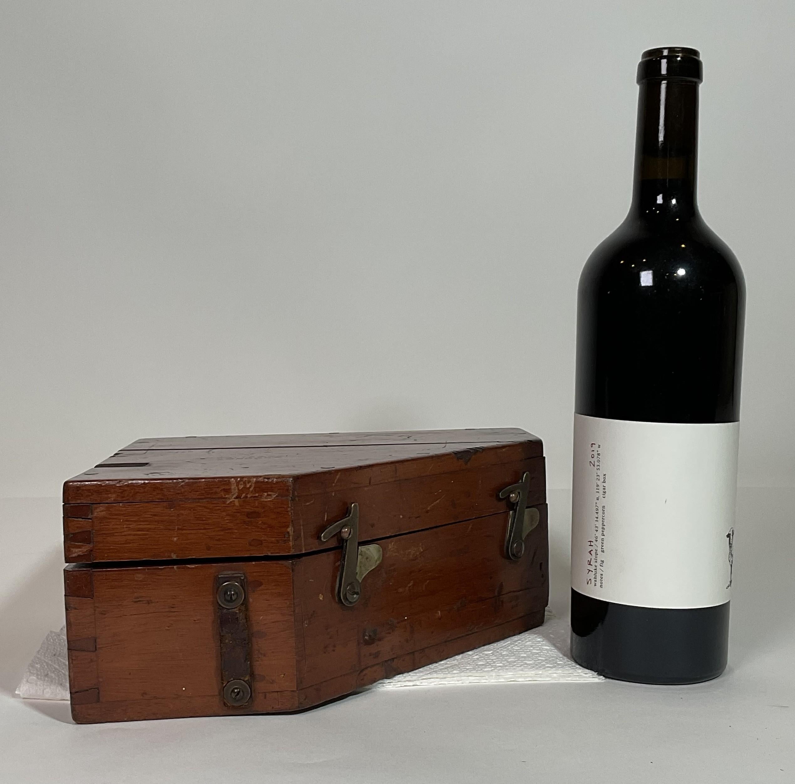 British Admiralty Mark I clinometer in a varnished wood box by E.R. Watts & Son, London, 1937. This instrument provides a highly accurate reading in degrees from dead level to 45 degrees. The box lid has a crack and is missing a chip.

Weight:    14
