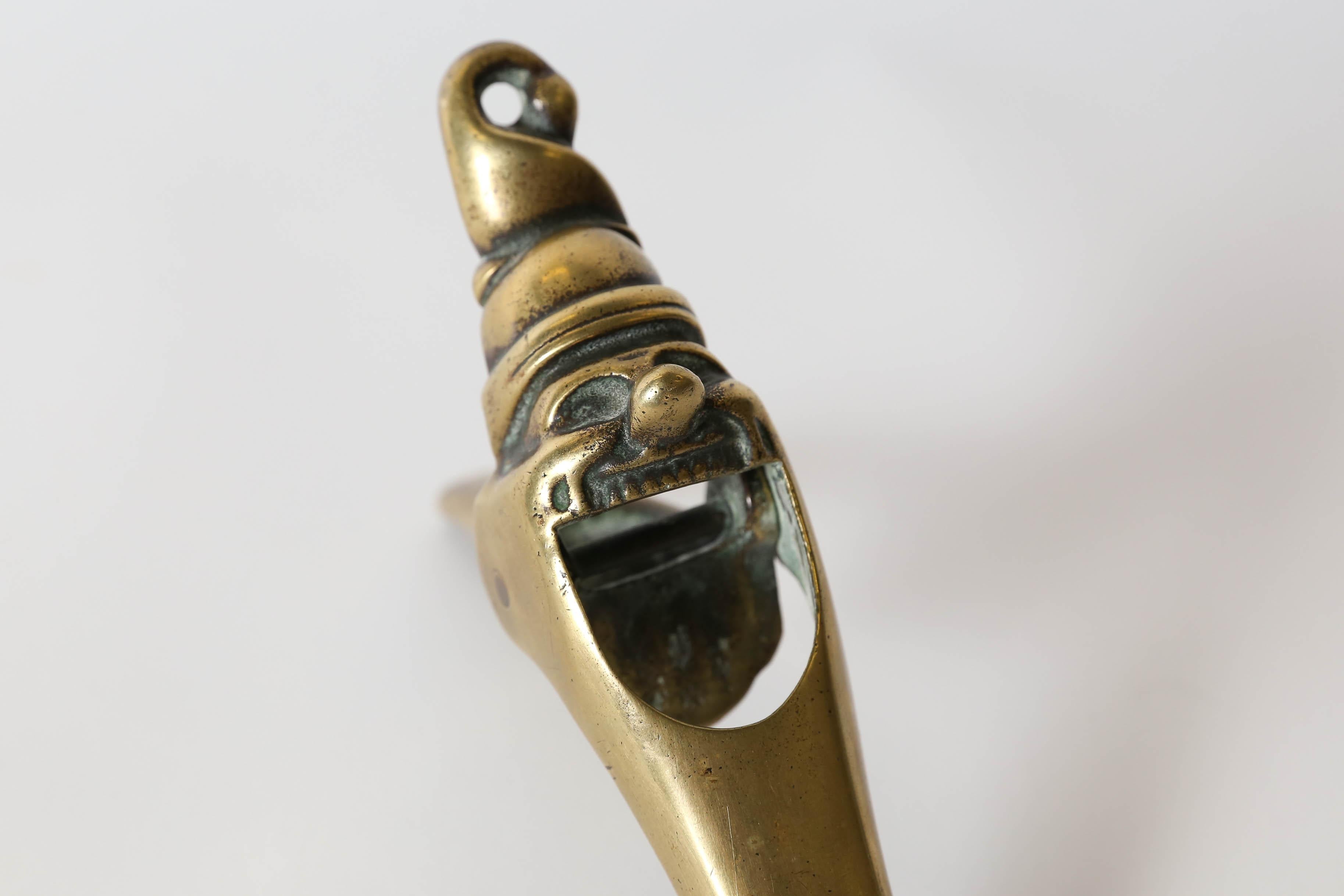 Solid brass English nutcracker. A whimsical and functional piece to add to your collection. Made in the early 1900s this piece is sure to delight the owner.