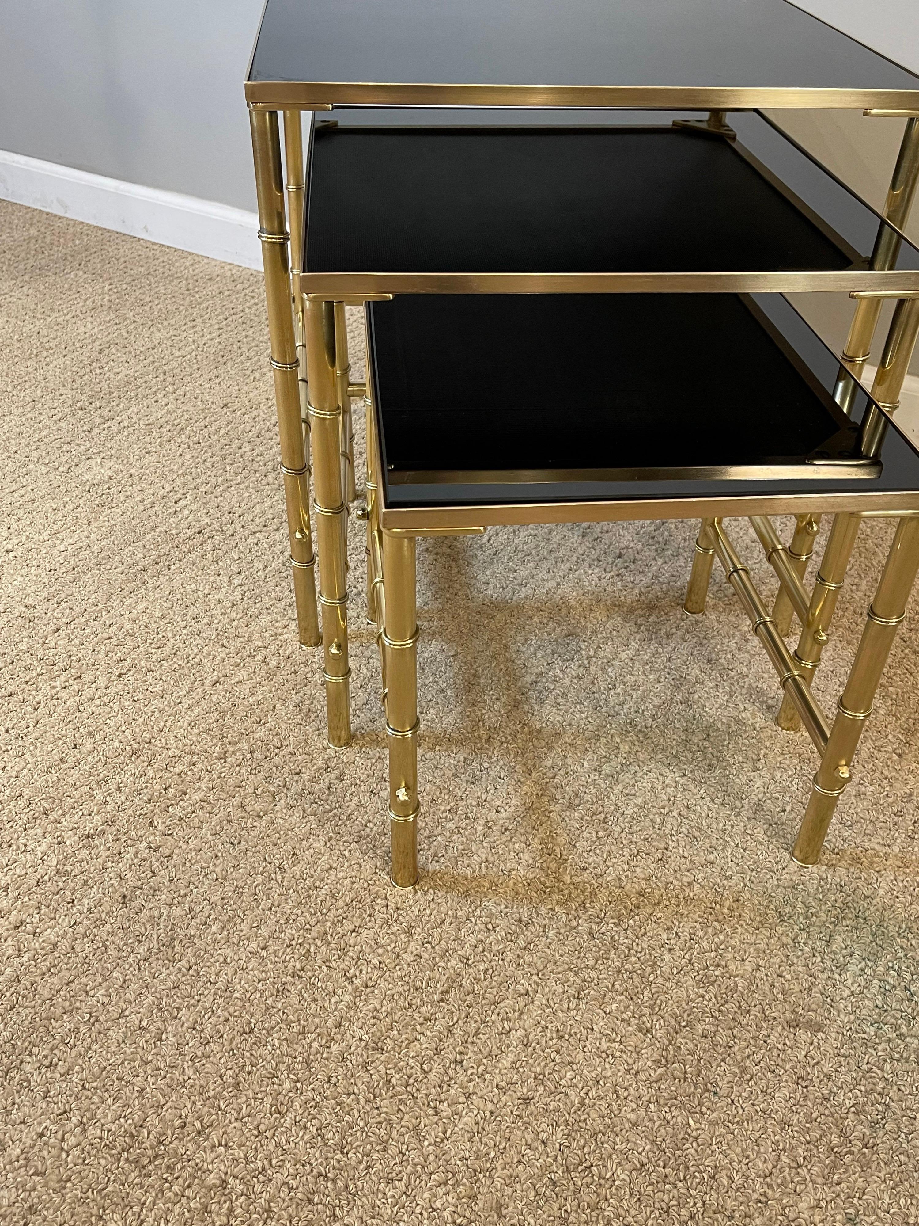 American Jansen Brass Faux Bamboo Set of 3 Nesting Tables with Black Vitrolite Glass For Sale