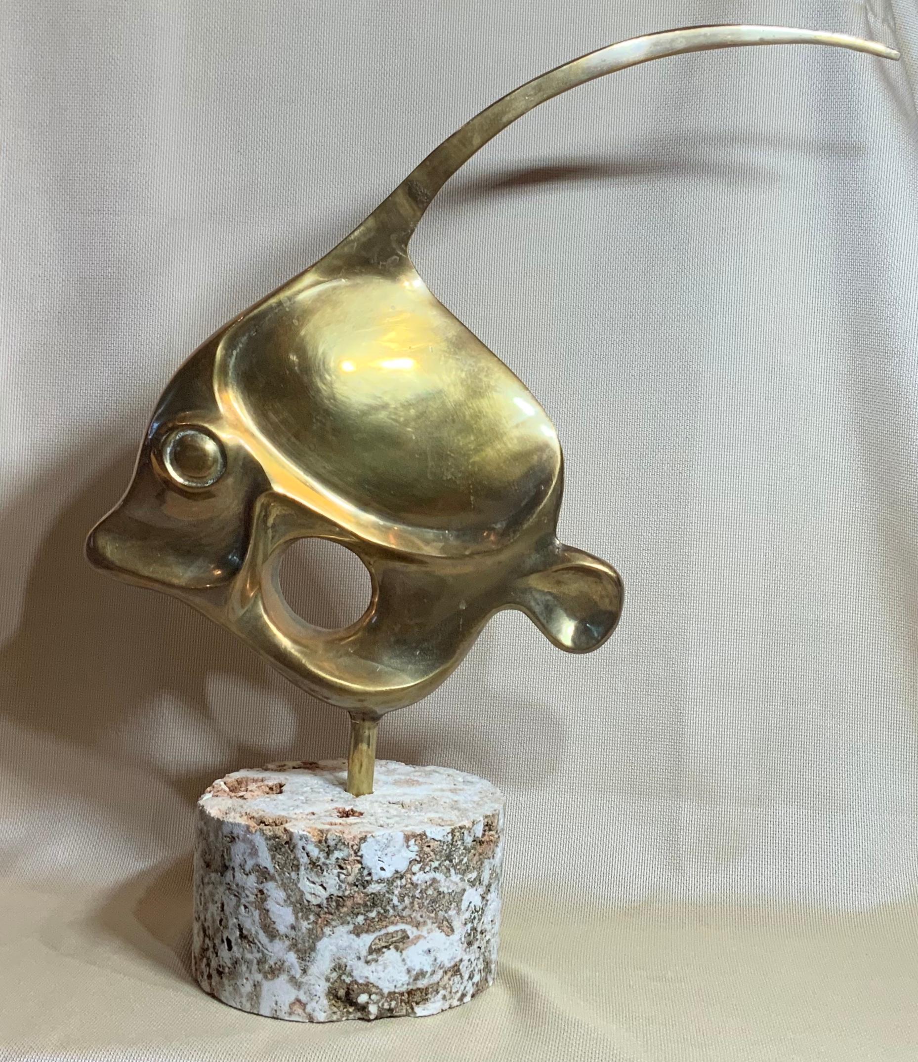 Elegant sculpture of fish made of solid brass, professionally mounted on natural sea coral base Beautiful object of art for display.