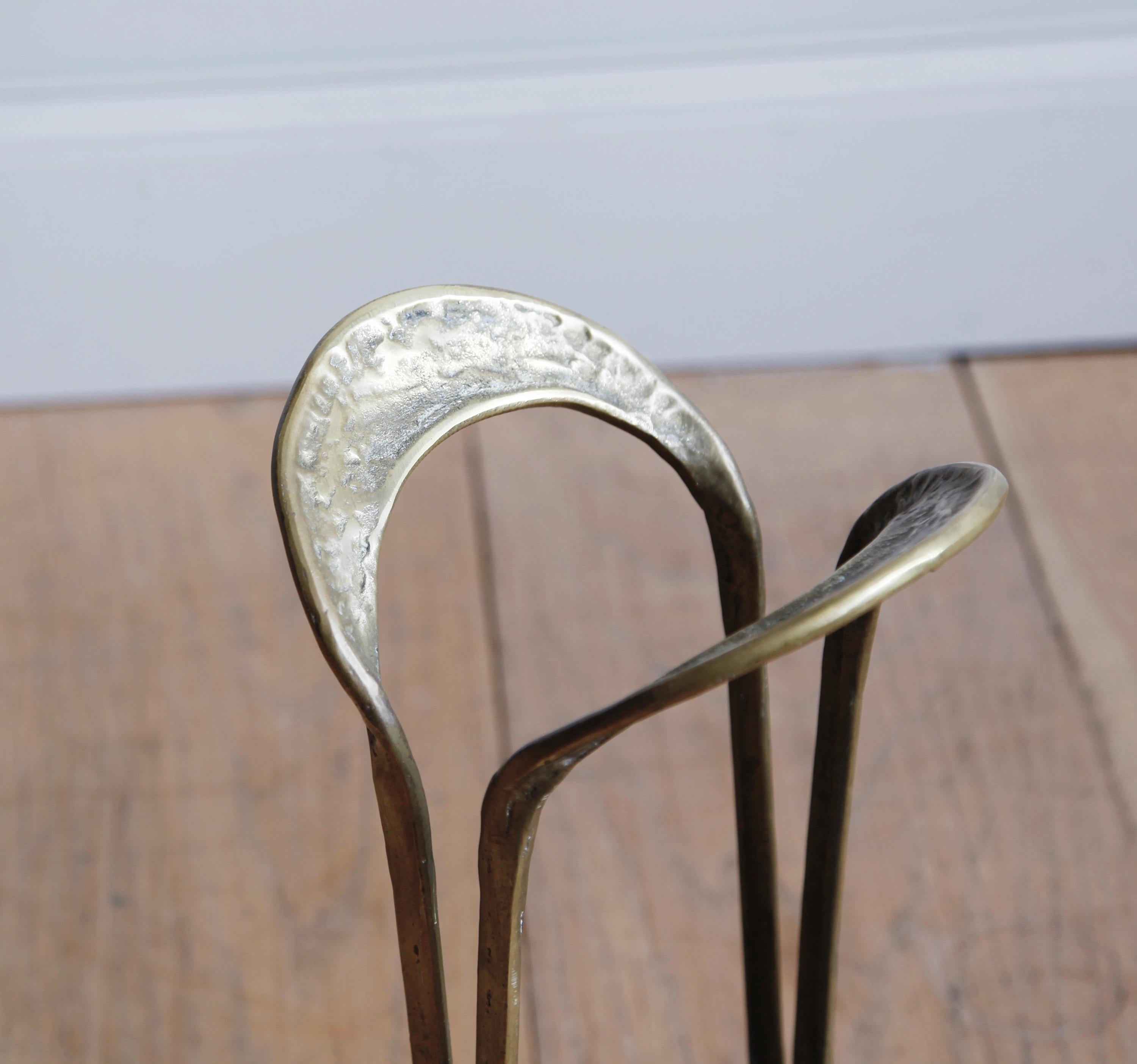 Simply beautiful, this streamlined brass stand will hold half a dozen walking sticks, or a few handsome umbrellas.