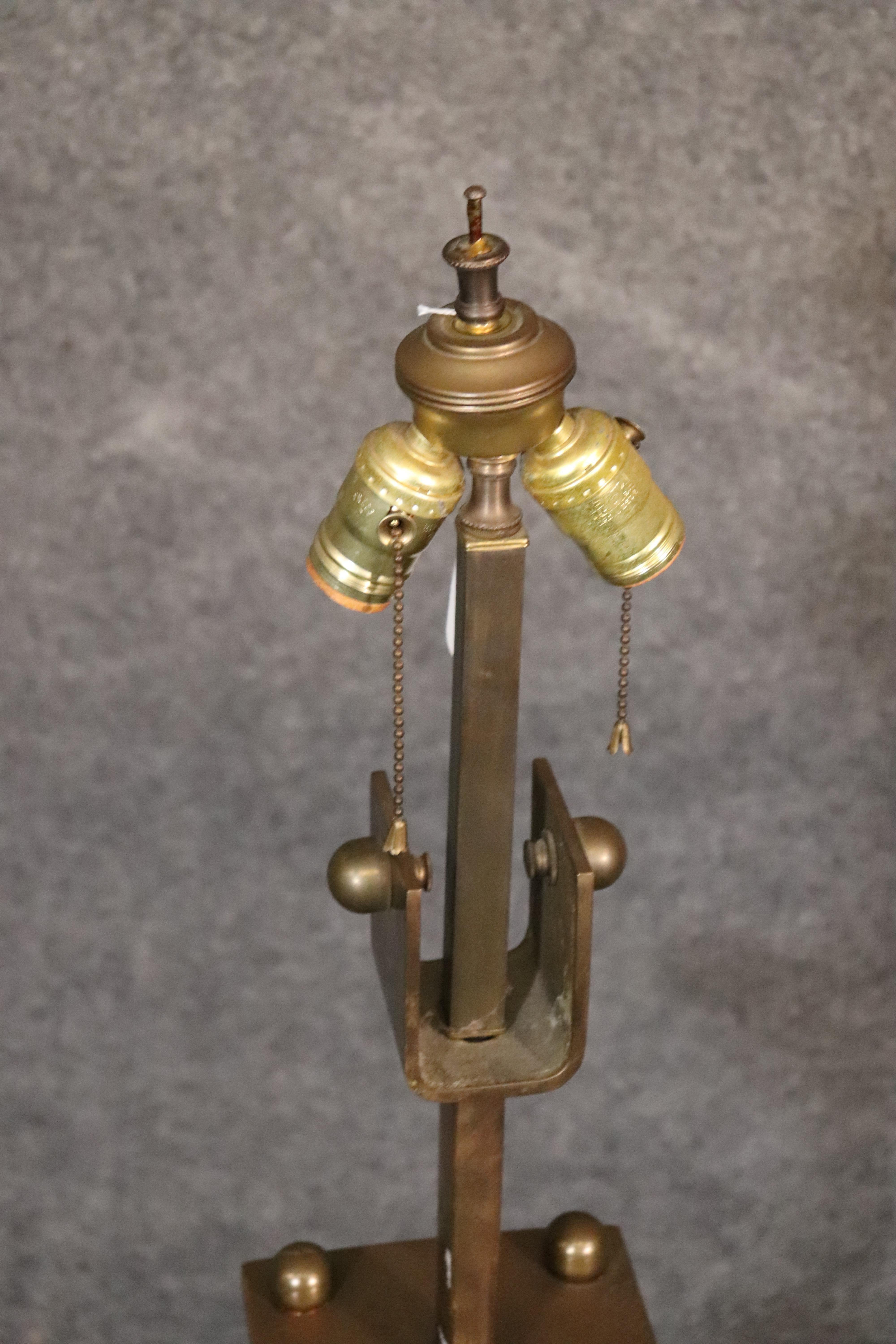 This is a very interesting lamp with strong industrial bones if you will. The lamp is 1950s and vintage and not a newer industrial knockoff. Measures: 39 tall x 7 x 7 and heavy.