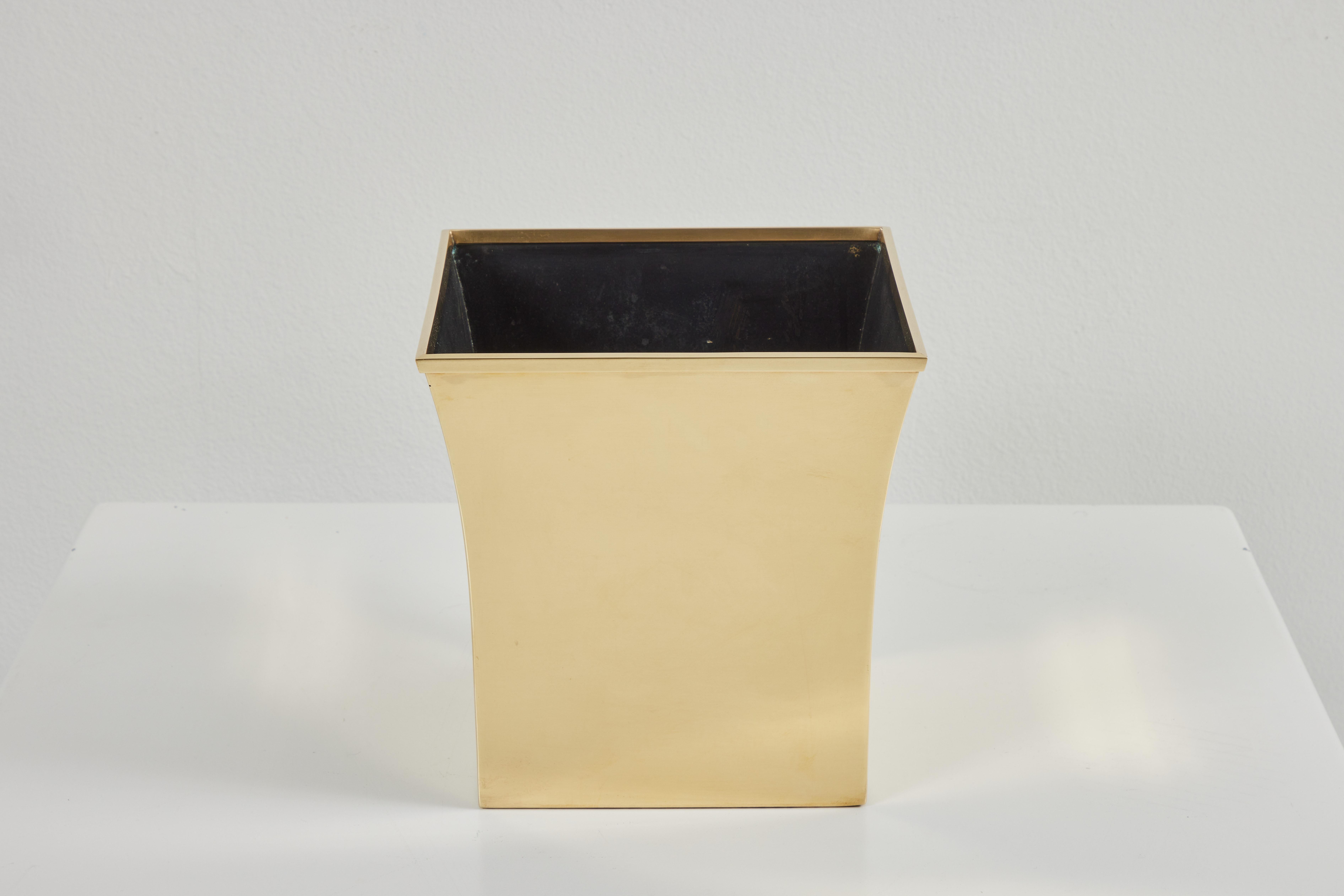 This solid brass waste basket by Karl Springer is simple yet elegant. The edges flair out just slightly and the inside is black. This waste basket came out of a home in Honolulu, Hawaii that contained numerous original and unique Karl Springer