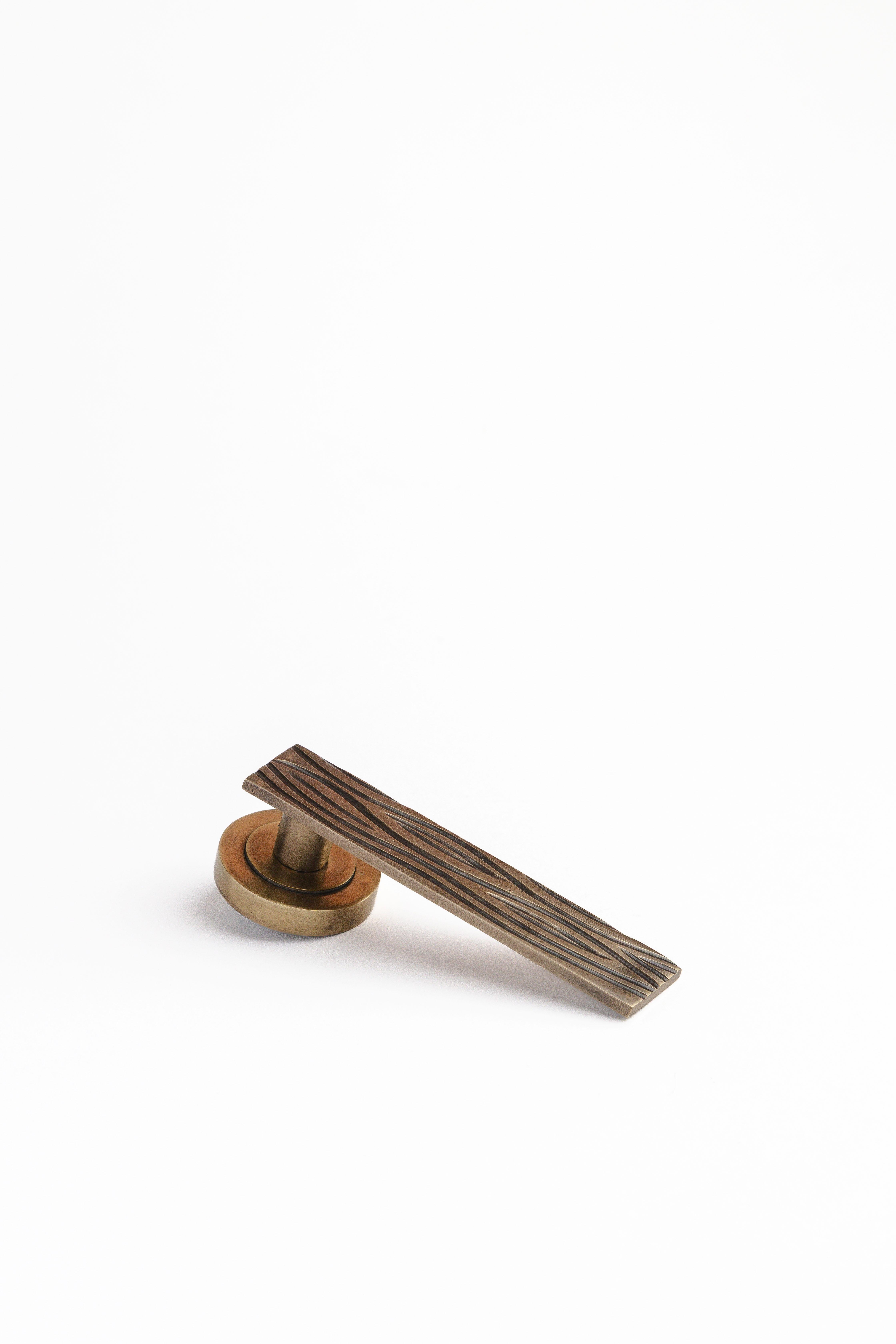 Solid brass lever handle with asymmetrical engravings For Sale 3