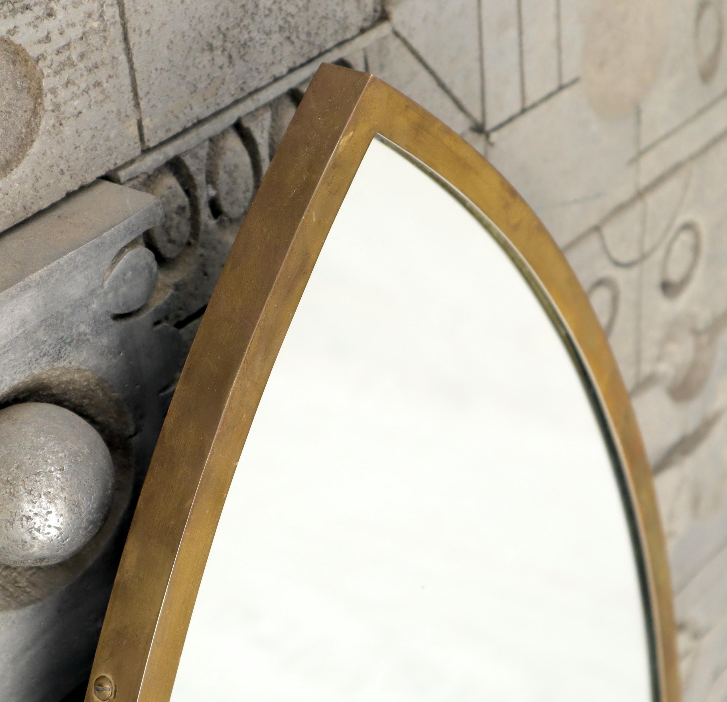 Mid-Century Modern solid brass profile frame dome shape wall mirror.