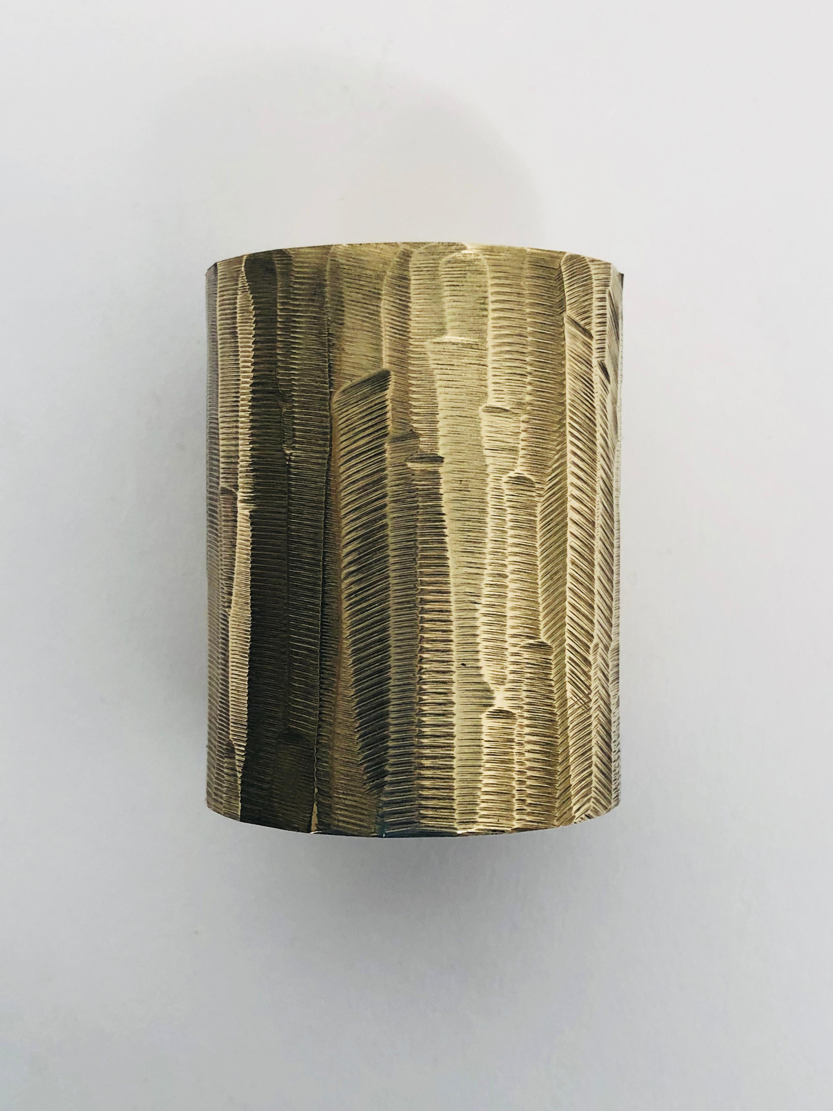Solid brass sculpted candleholder Signed by William Guillon
Signed: William Guillon
Dimensions: Diameter 4 x height 5 cm
Diameter 3.5 x height 6 cm
Materials: Solid brass raw finish or patinated black, with polished edge
Hand-sculpted in