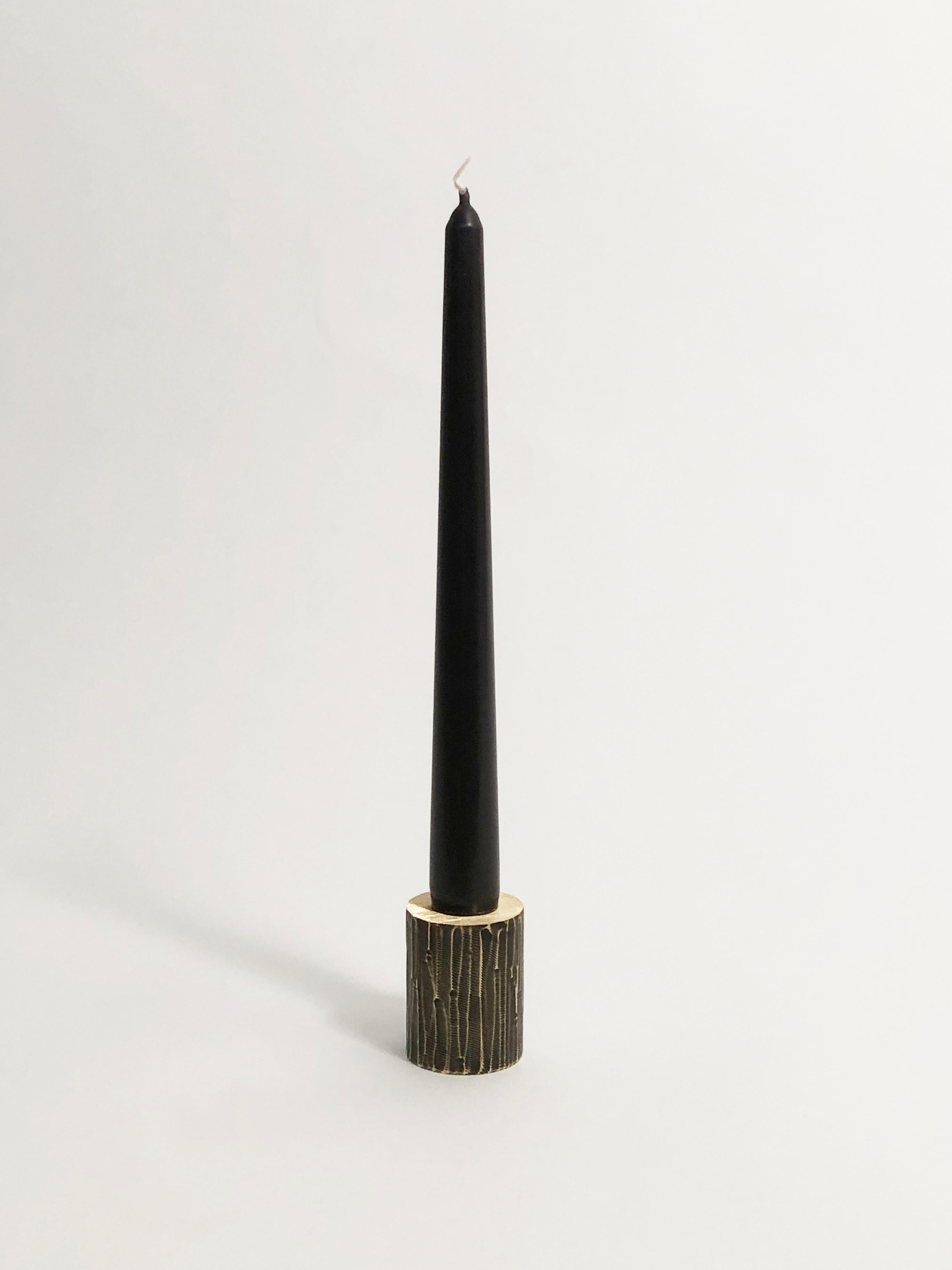 Solid brass sculpted candleholder by William Guillon by William Guillon 
Signed William Guillon
Dimensions: Diameter 4 x height 5 cm
Also available: Diameter 3.5 x height 6 cm
Materials: Solid brass, patinated black finish, with polished edge
 Raw
