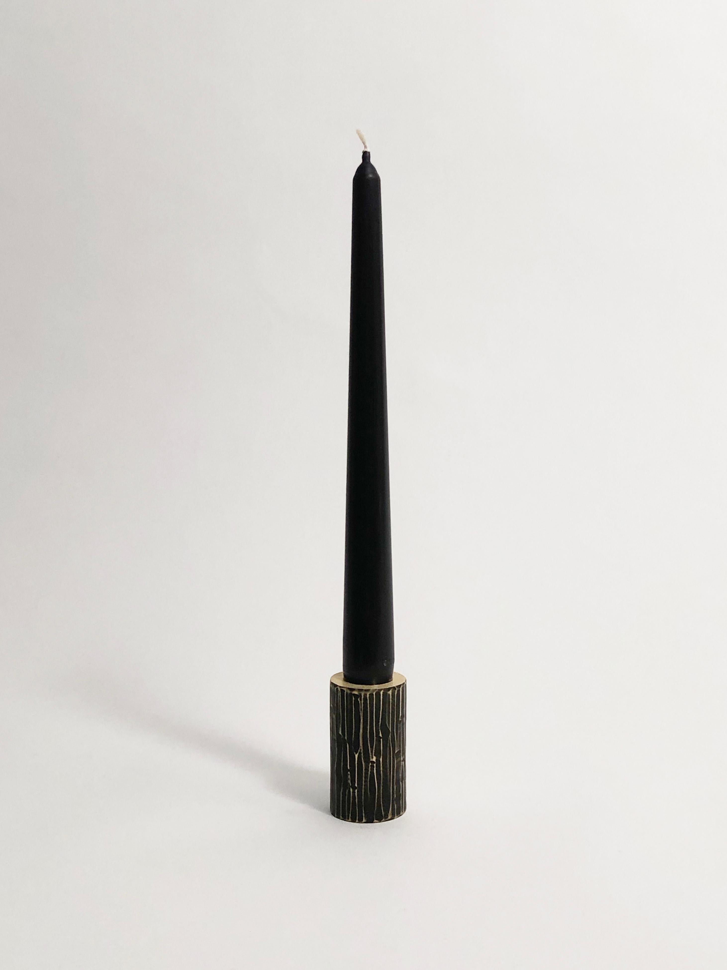Solid brass sculpted candleholder by William Guillon
Signed William Guillon
Dimensions: Diameter 3.5 x height 6 cm
Also available: Diameter 4 x height 5 cm
Materials: Solid brass patinated black finish, with polished edge
Raw finish