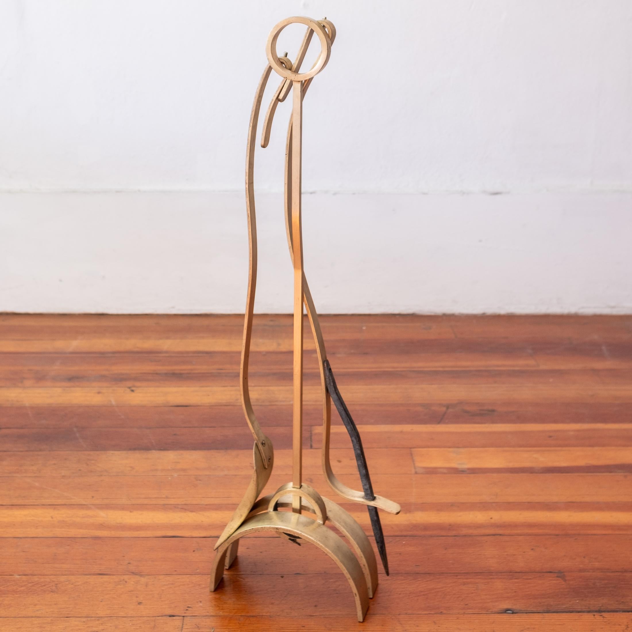 Solid brass fireplace tool set. Great craftsmanship. Set includes a shovel, poker and stand. 