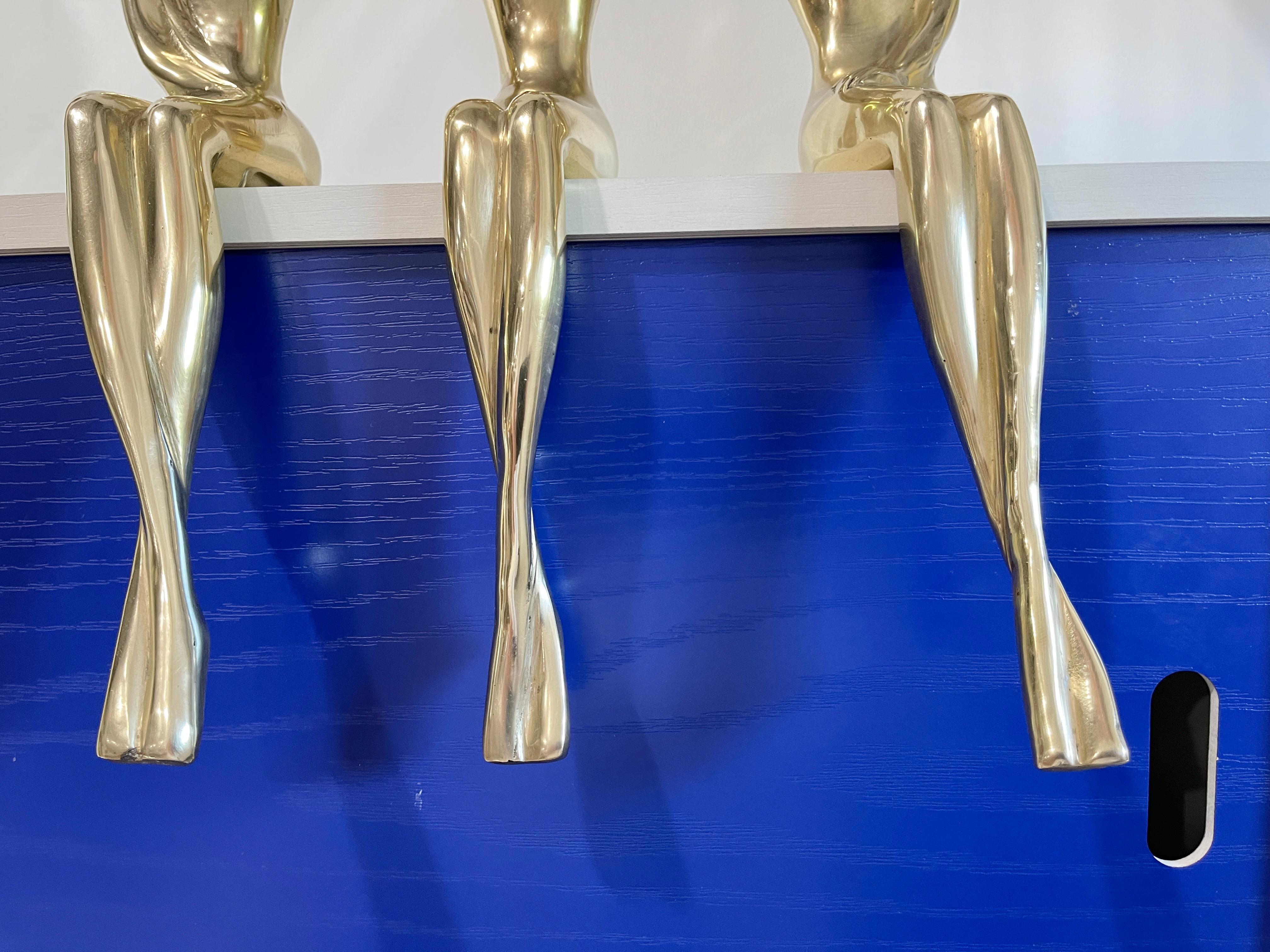 Solid Brass Shelf Sitters by Dolbi Cashier 2