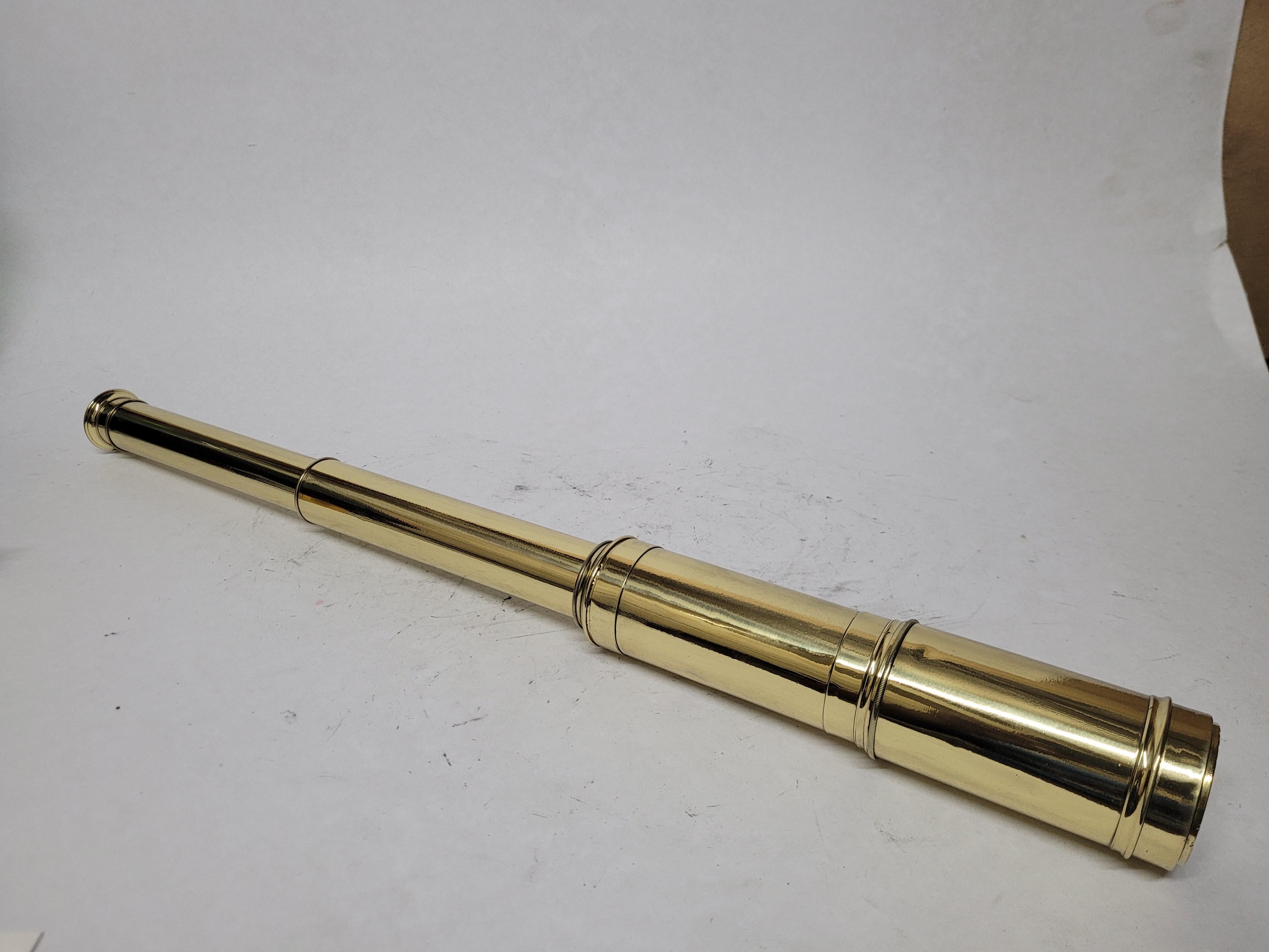 Ships spyglass telescope appropriate for use on a yacht, ship, or anywhere with a view. This has been meticulously polished and lacquered. We just restored a great collection of these. This fine instrument has a two draw barrel of solid brass. The