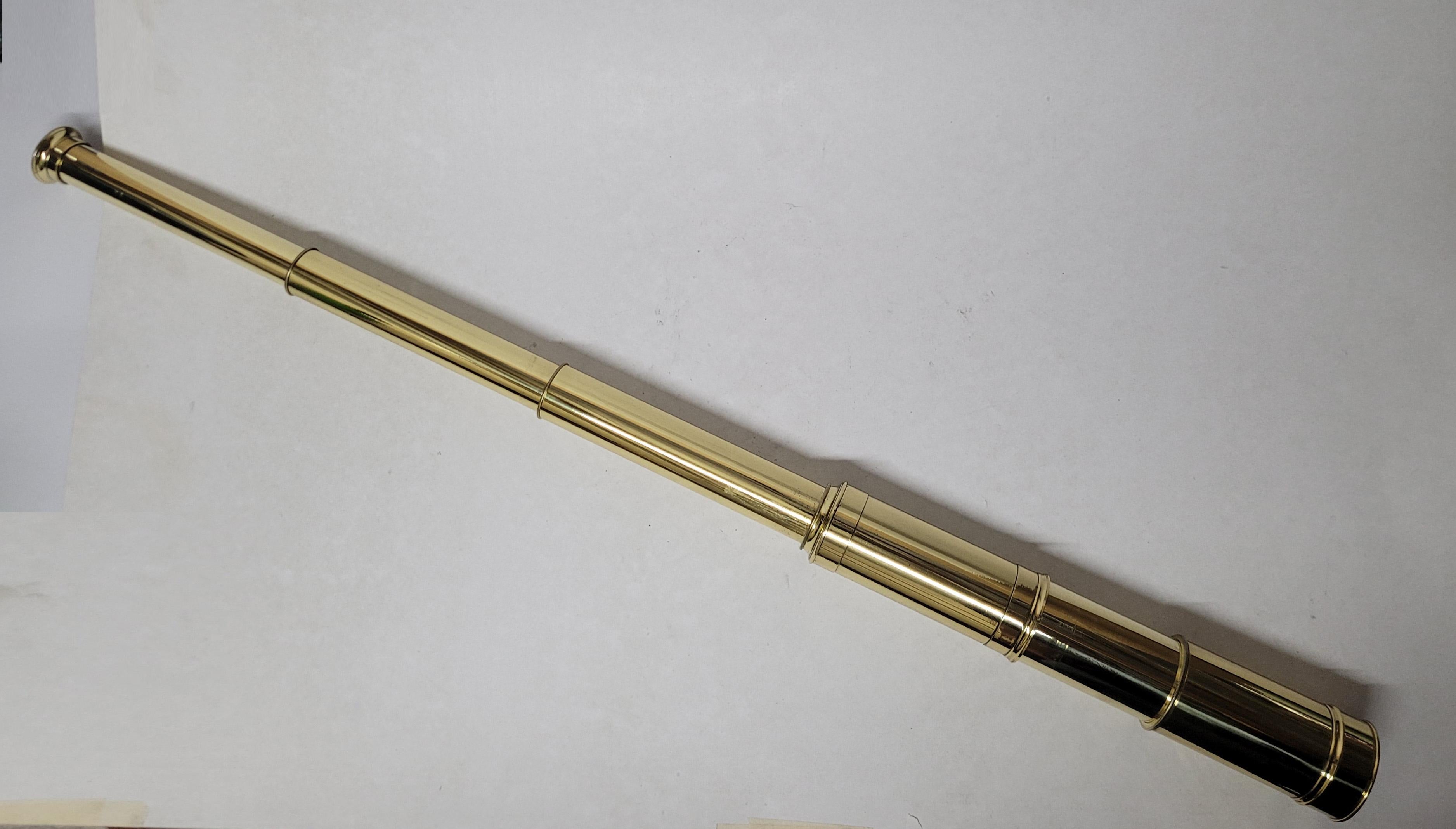 Ships spyglass telescope appropriate for use on a yacht, ship, or anywhere with a view. This has been meticulously polished and lacquered. We just restored a great collection of these. This fine instrument has a two draw barrel of solid brass. Also