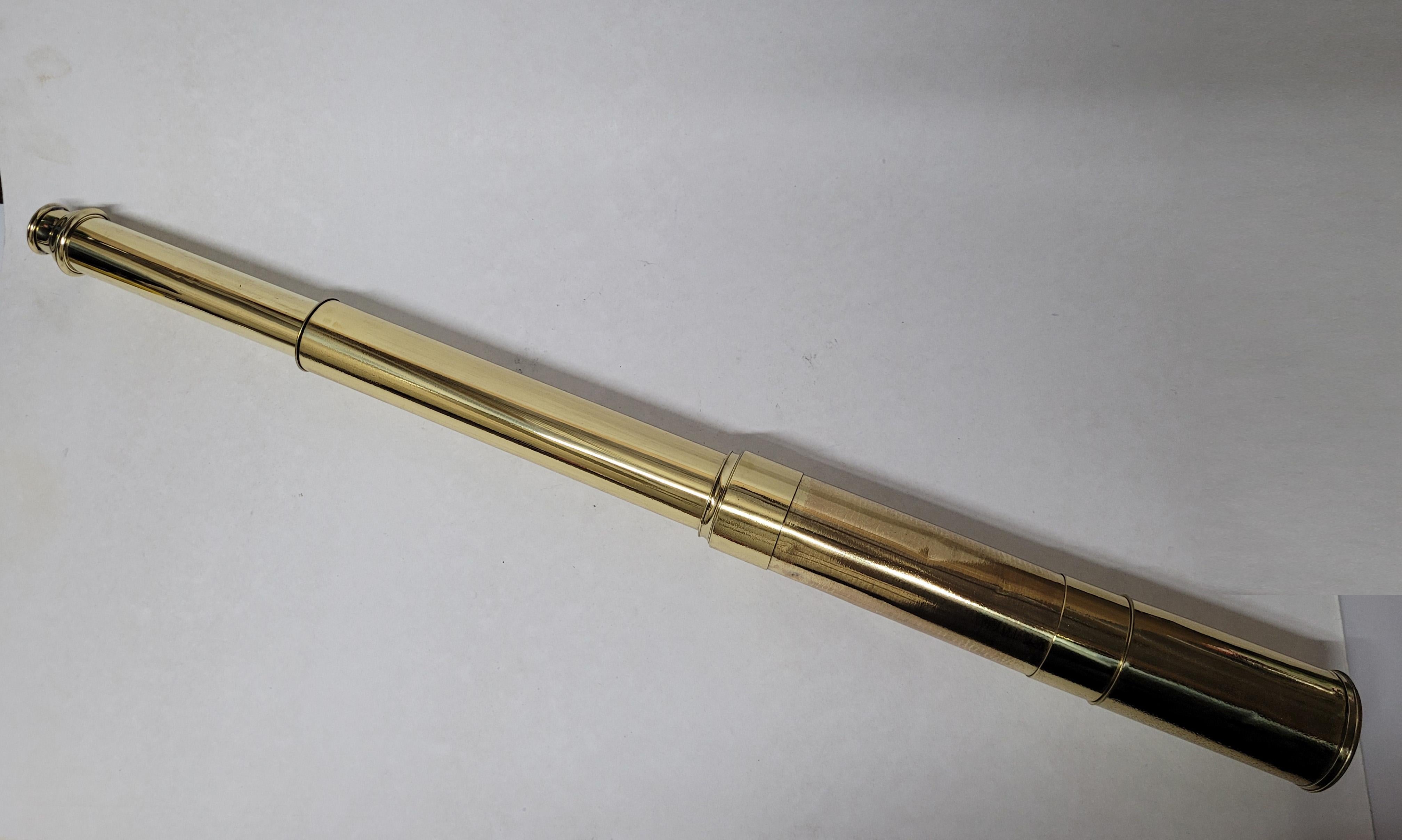 Ships spyglass telescope appropriate for use on a yacht, ship, or anywhere with a view. This has been meticulously polished and lacquered. We just restored a great collection of these. This fine instrument has a two draw barrel of solid brass.